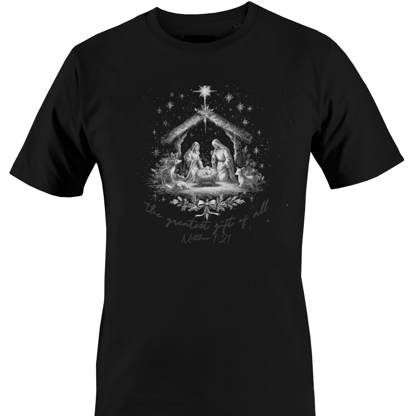 A black short-sleeve crewneck t-shirt featuring a detailed grayscale graphic of the Nativity Holy Family in a stable under a star, with the text 'the greatest gift of all is the present gift of God' and 'Mother of God' written below by Monkey's Creations.