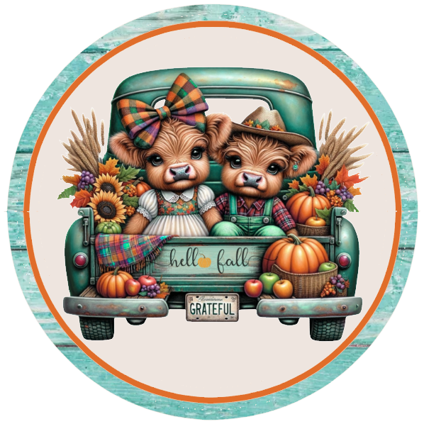Two highland cows in a truck with fall decorations