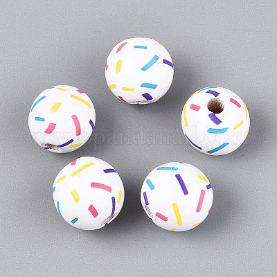 Painted white wooden beads with multicolor confetti for crafting and wreath making.