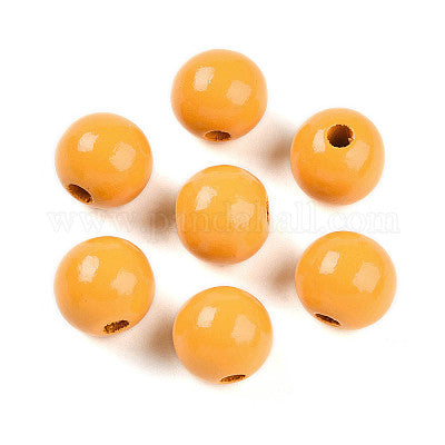 Painted orange wooden beads for crafting and wreath making