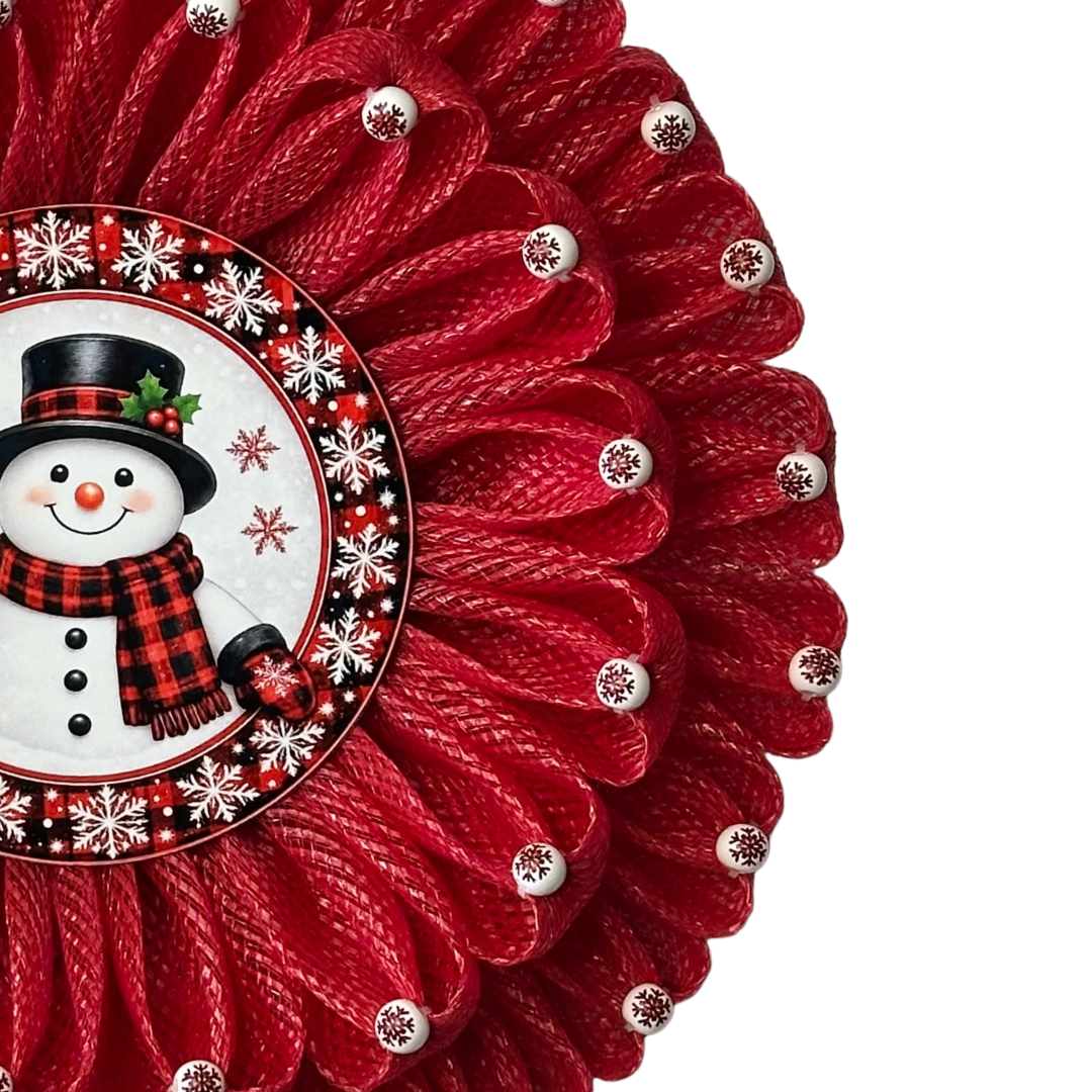 Deco mesh wreath with beaded tips and a wintery buffalo check plaid snowman center by Monkey's Creations.
