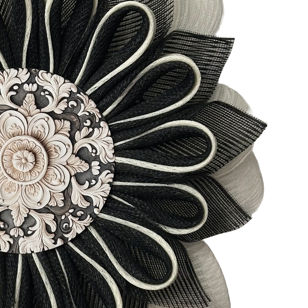 Deco mesh flower wreath with black and creme petals and a charcoal and creme ornate center by Monkey's Creations
