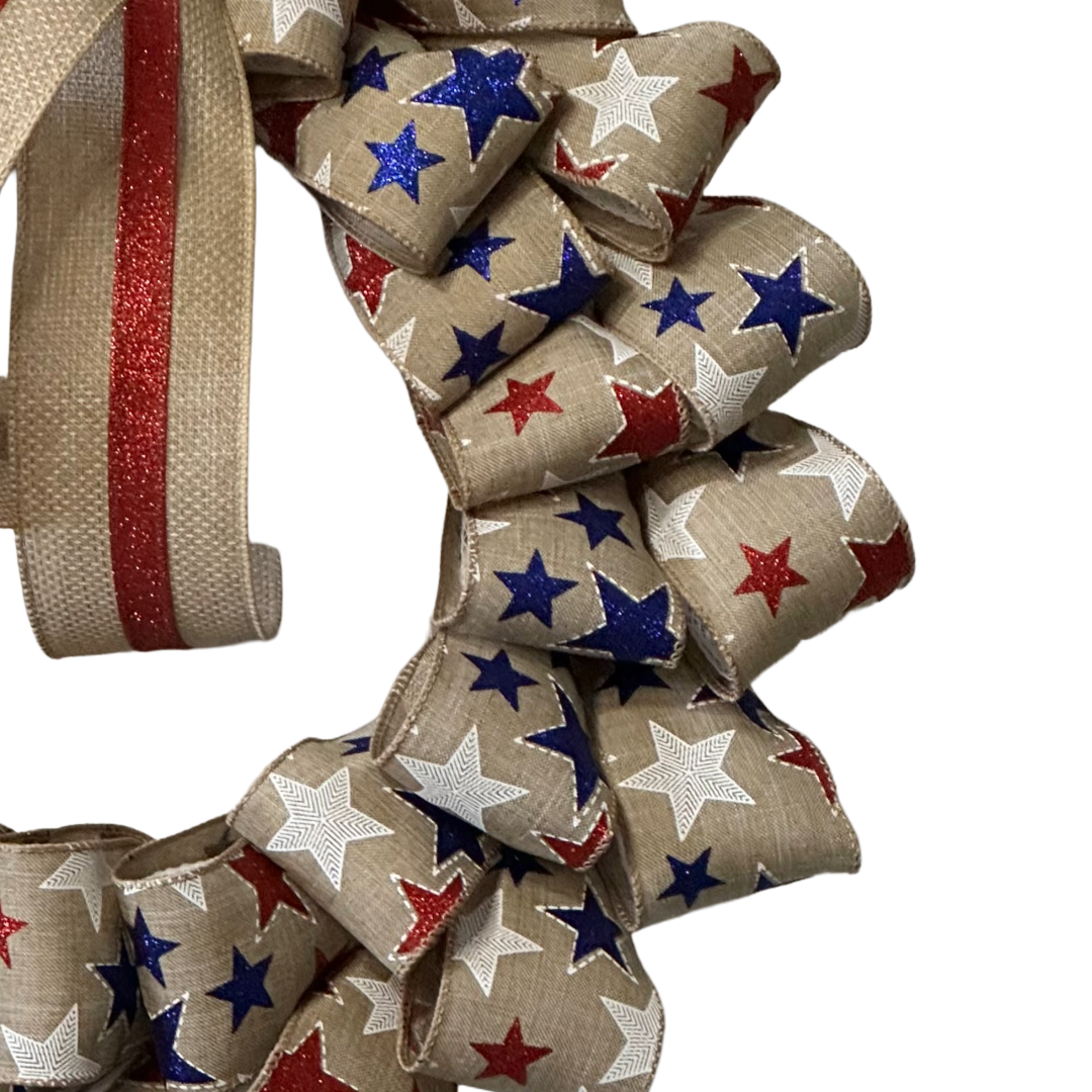 Americana stars on natural deco mesh and ribbon wreath by Monkey's Creations.