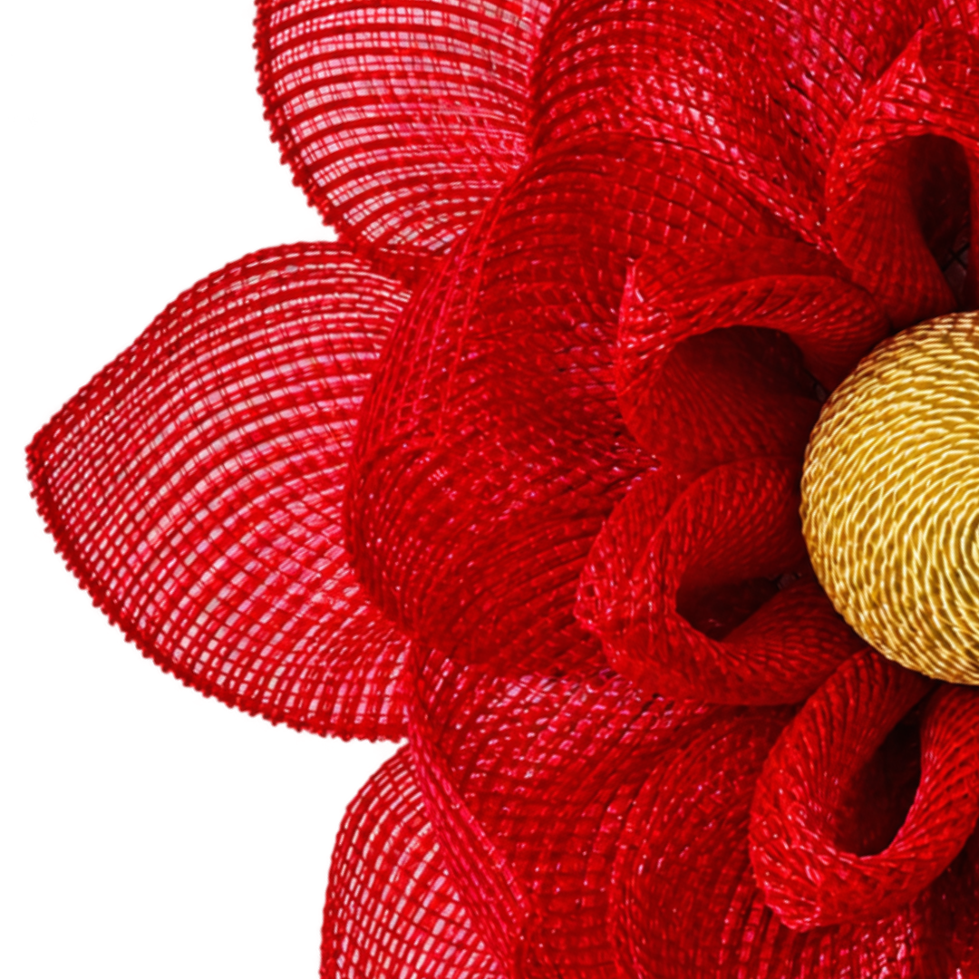 Red deco mesh magnolia flower wreath with a golden yellow rope center by Monkey's Creations.