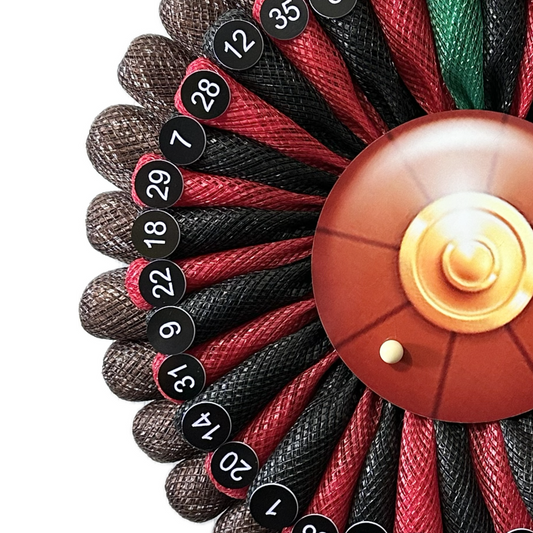 Wreath depicting a roulette wheel with numbers and a ball
