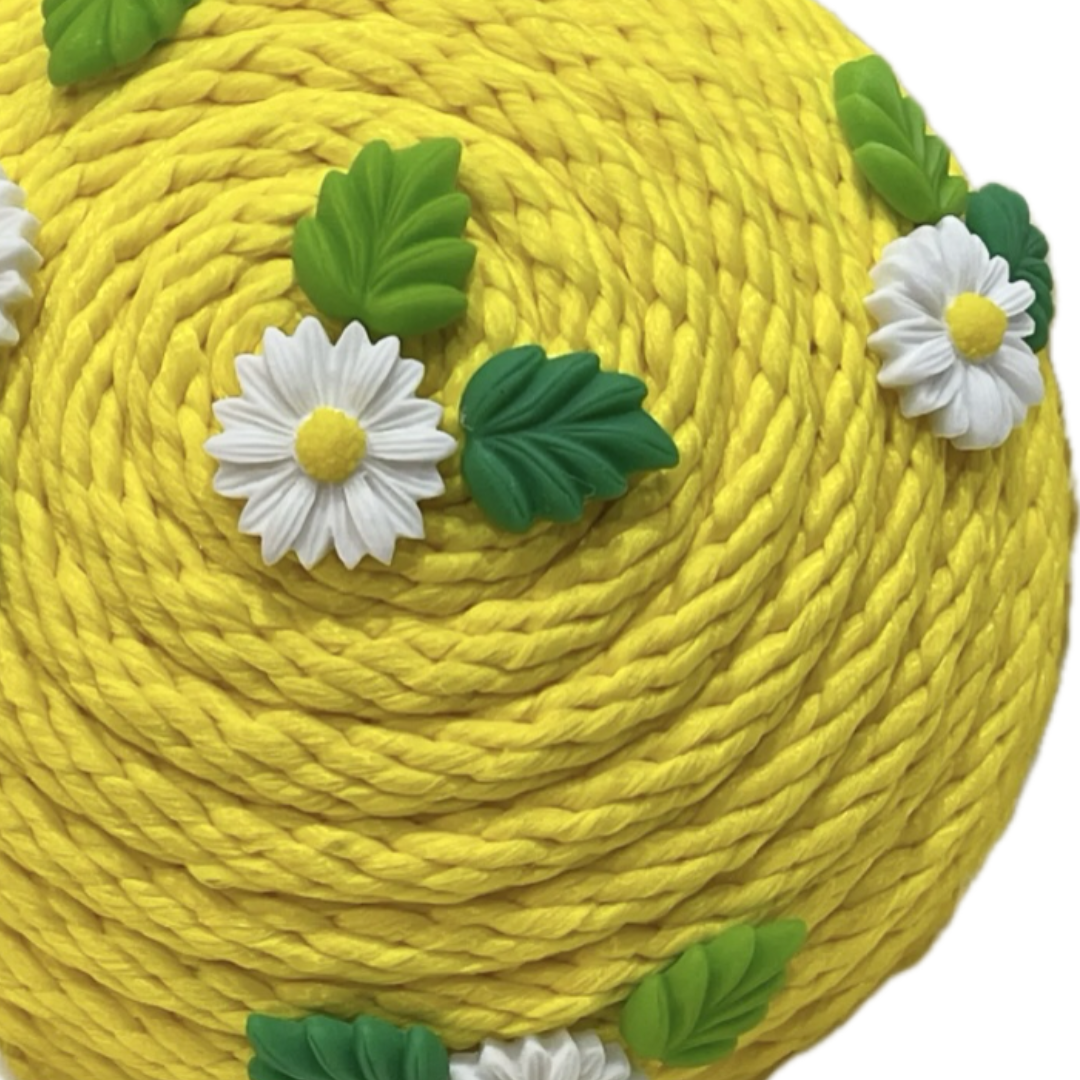 yellow rope round flower center with white daisies