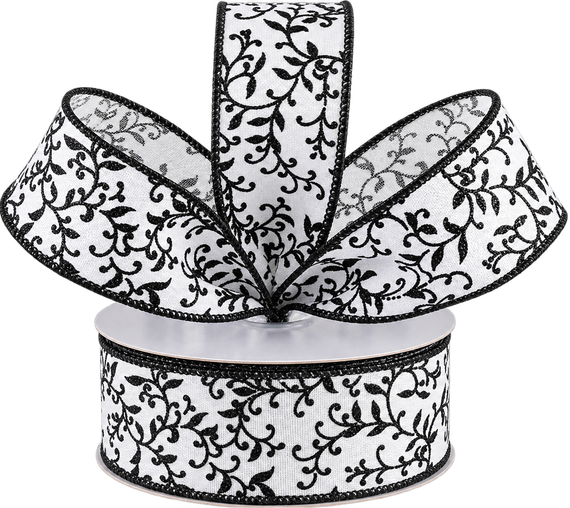 1.5" by 10 yard roll of wired white ribbon with glittery black mini leaf vines. 