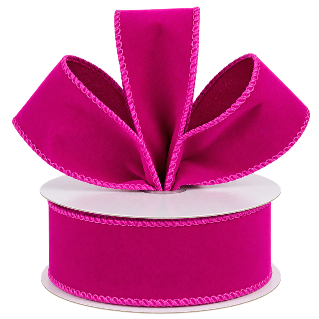 A roll of 1.5" x 10 yard fuchsia velvet wired ribbon