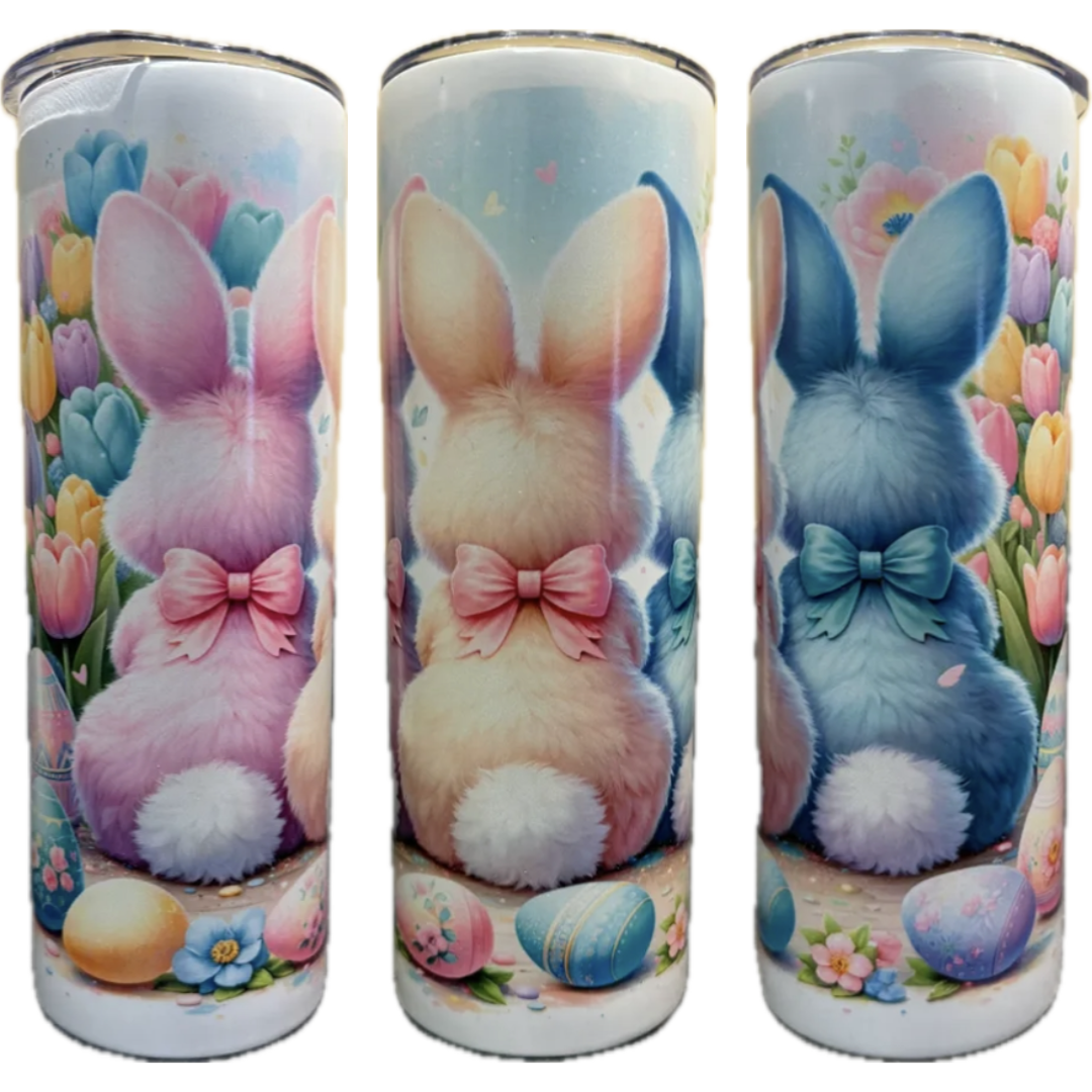 Easter tumbler with colorful bunny butts on a white background