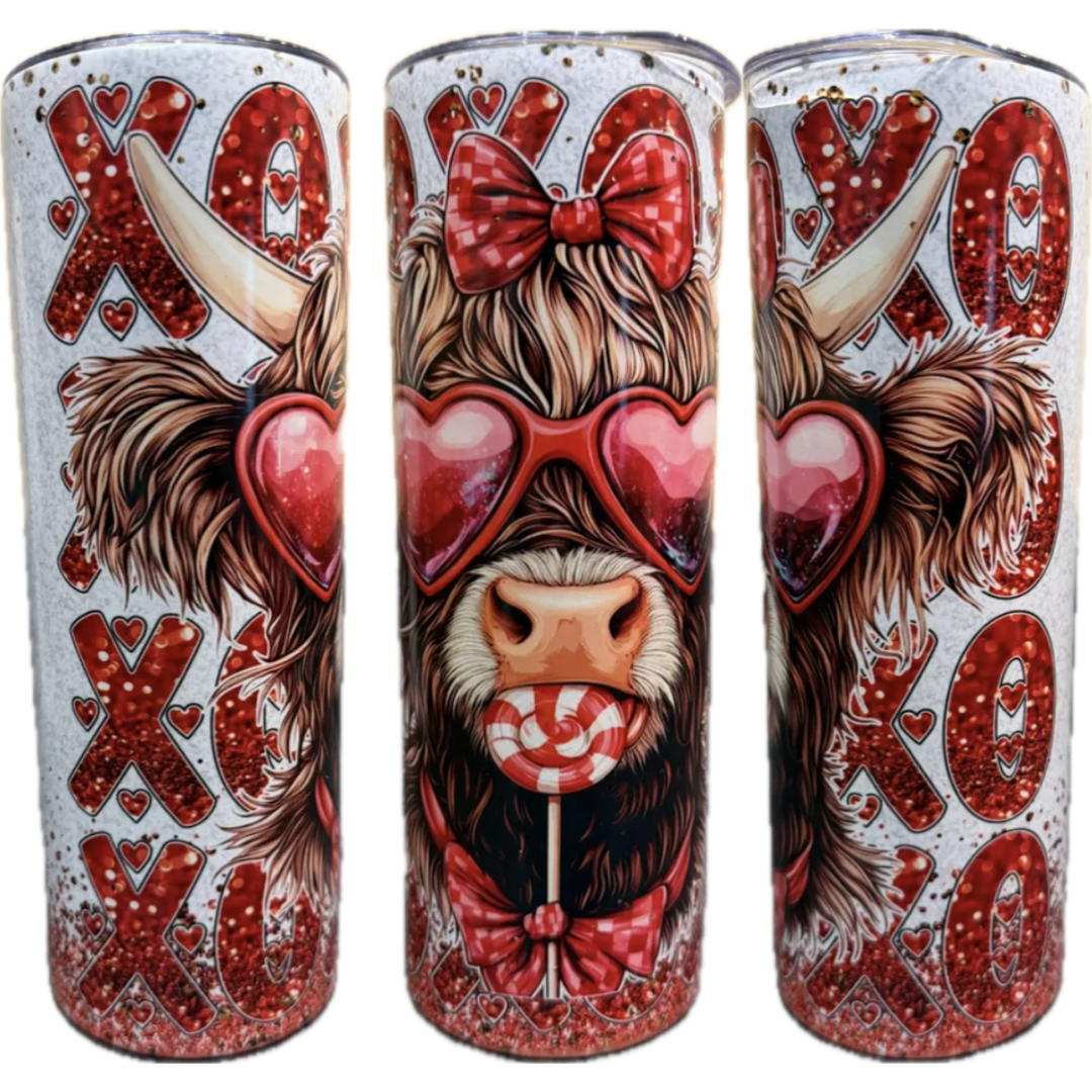 Valentine highland cow design tumbler with hearts, and 'XO' text on a white background.