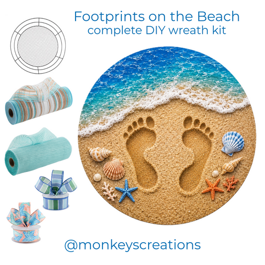 Complete diy wreath kit featuring deco mesh, ribbon, a wreaths of joy work form and a round metal wreath sign with seashells and footprints in the sand by Monkey's Creations. 
