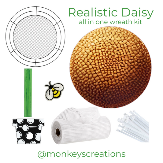 Realistic daisy wreath kit designed by Monkey's Creations including a Wreaths of Joy wire frame, daisy inspired flower center sign, polka dot flower pot with stem, white deco mesh, a bee and zip ties