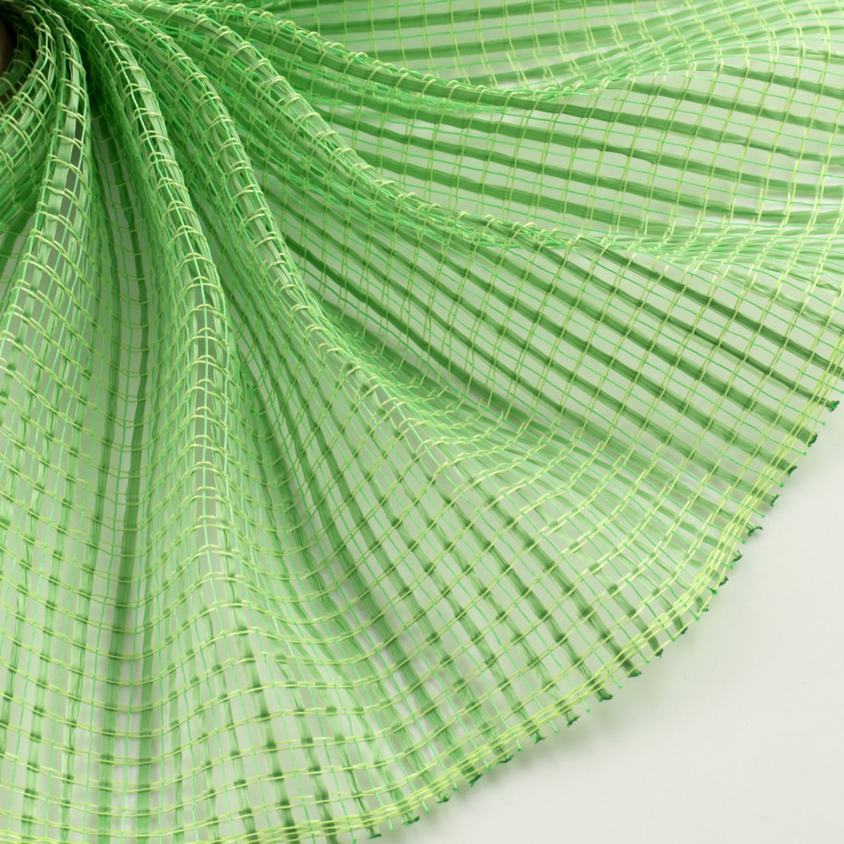 Close up of lime green horizontal wide stripe deco mesh weave MPN RE890068