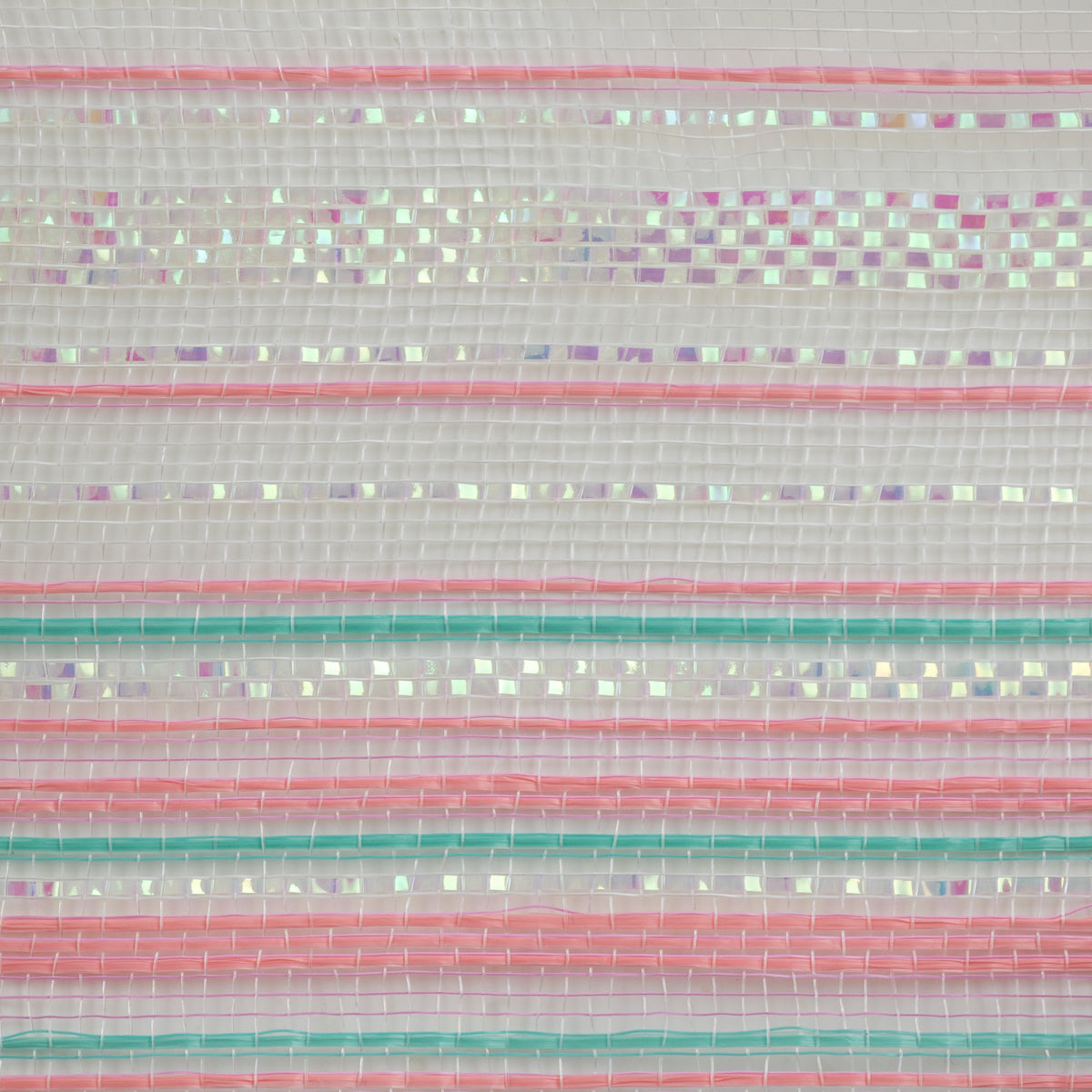 Close up of ombre style blush pink, teal and iridescent white vertical wide stripe deco mesh weave