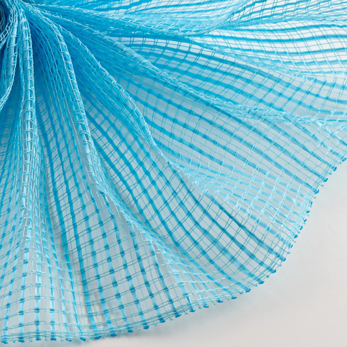 Turquoise horizontal wide stripe deco mesh close up of weave