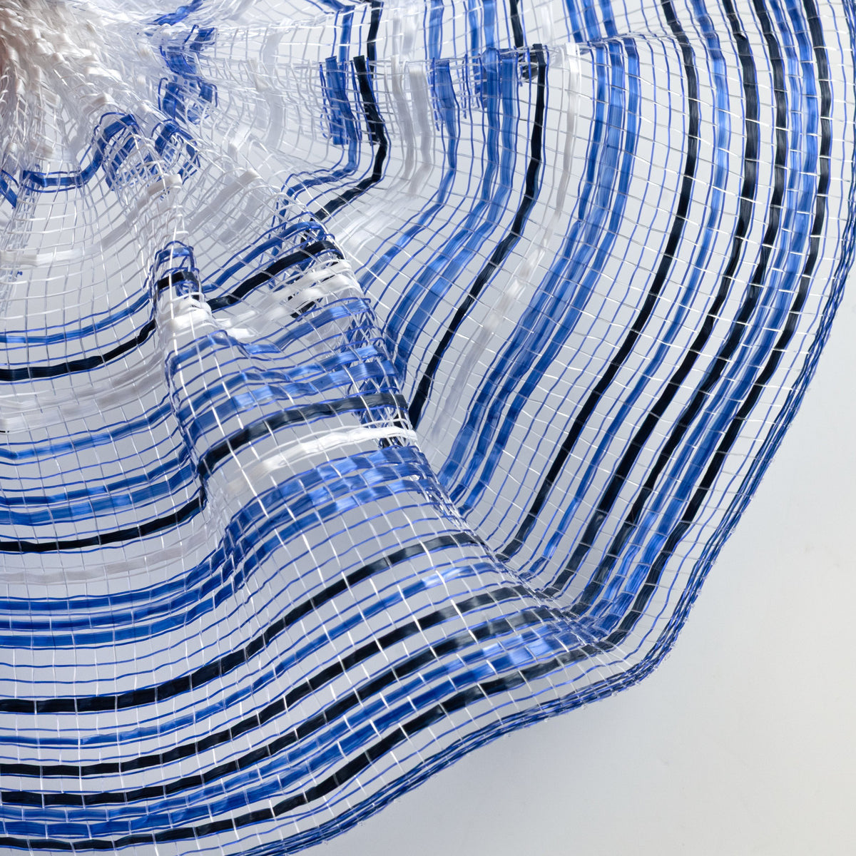 Close up of vertical wide stripe ombre deco mesh weave with navy blue, royal blue and white stripes MPN RE13862A