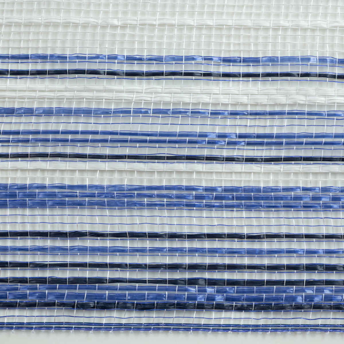 Close up of vertical wide stripe ombre deco mesh weave with navy blue, royal blue and white stripes MPN RE13862A