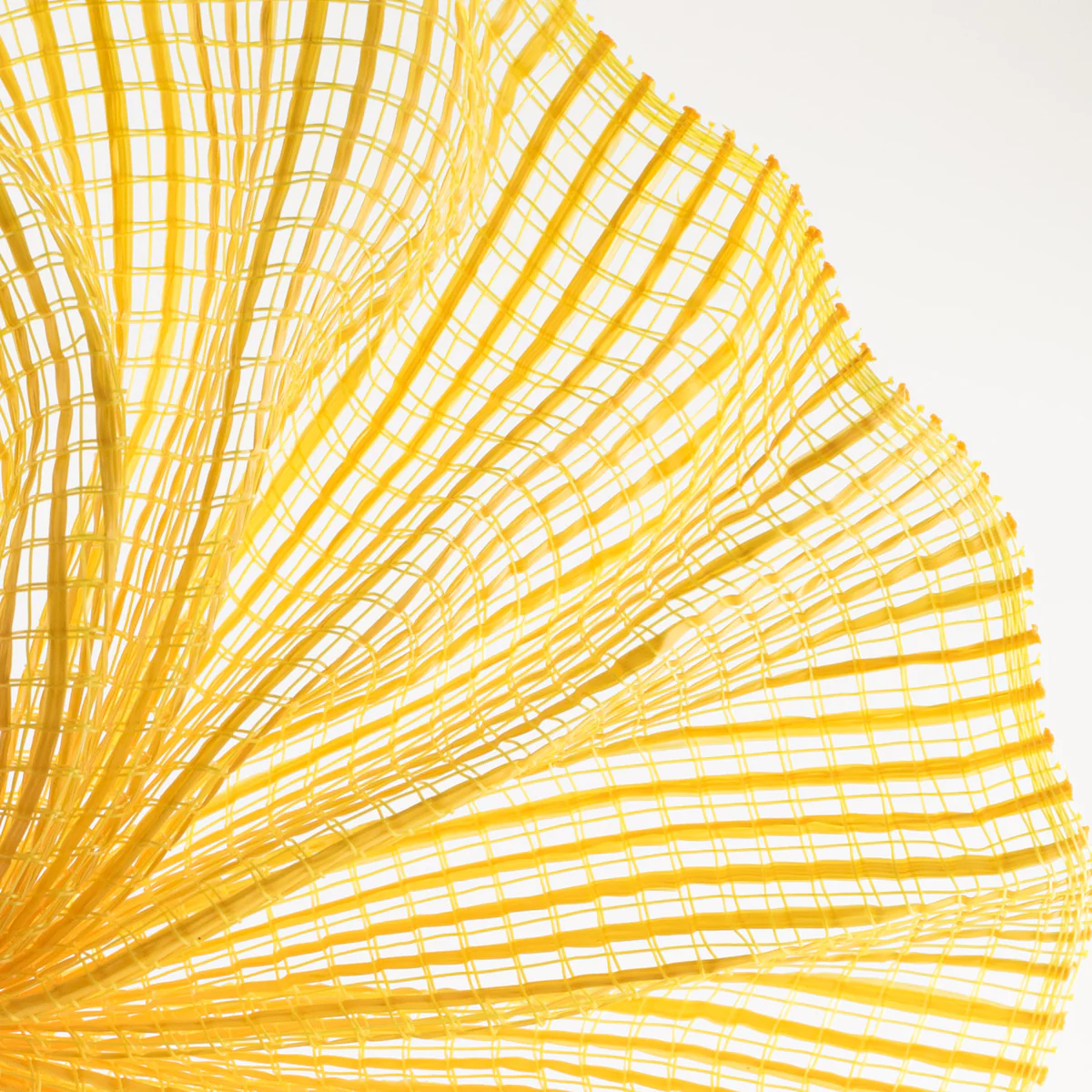 Close up of yellow horizontal wide stripe deco mesh weave fanned