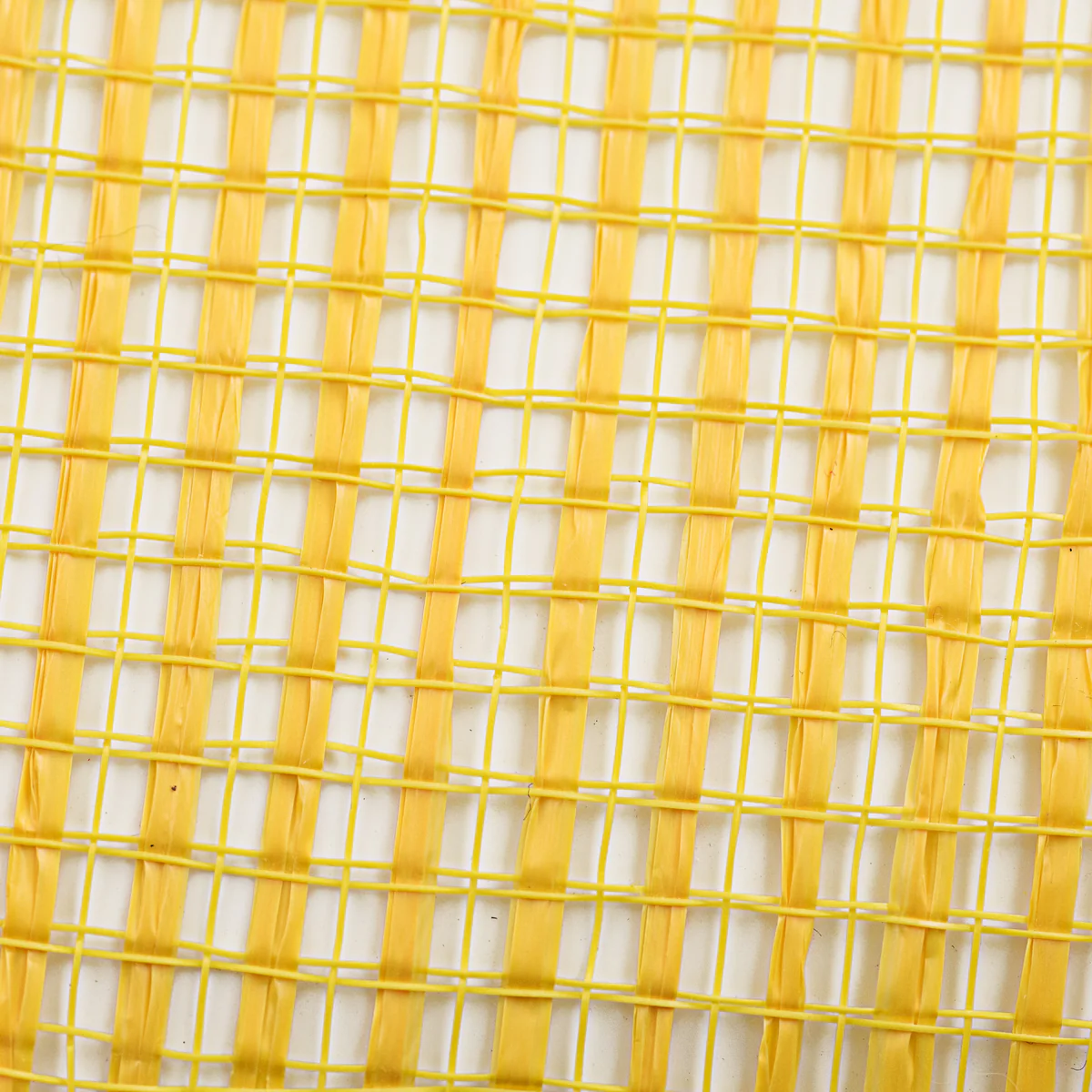 Close up of yellow horizontal wide stripe deco mesh weave