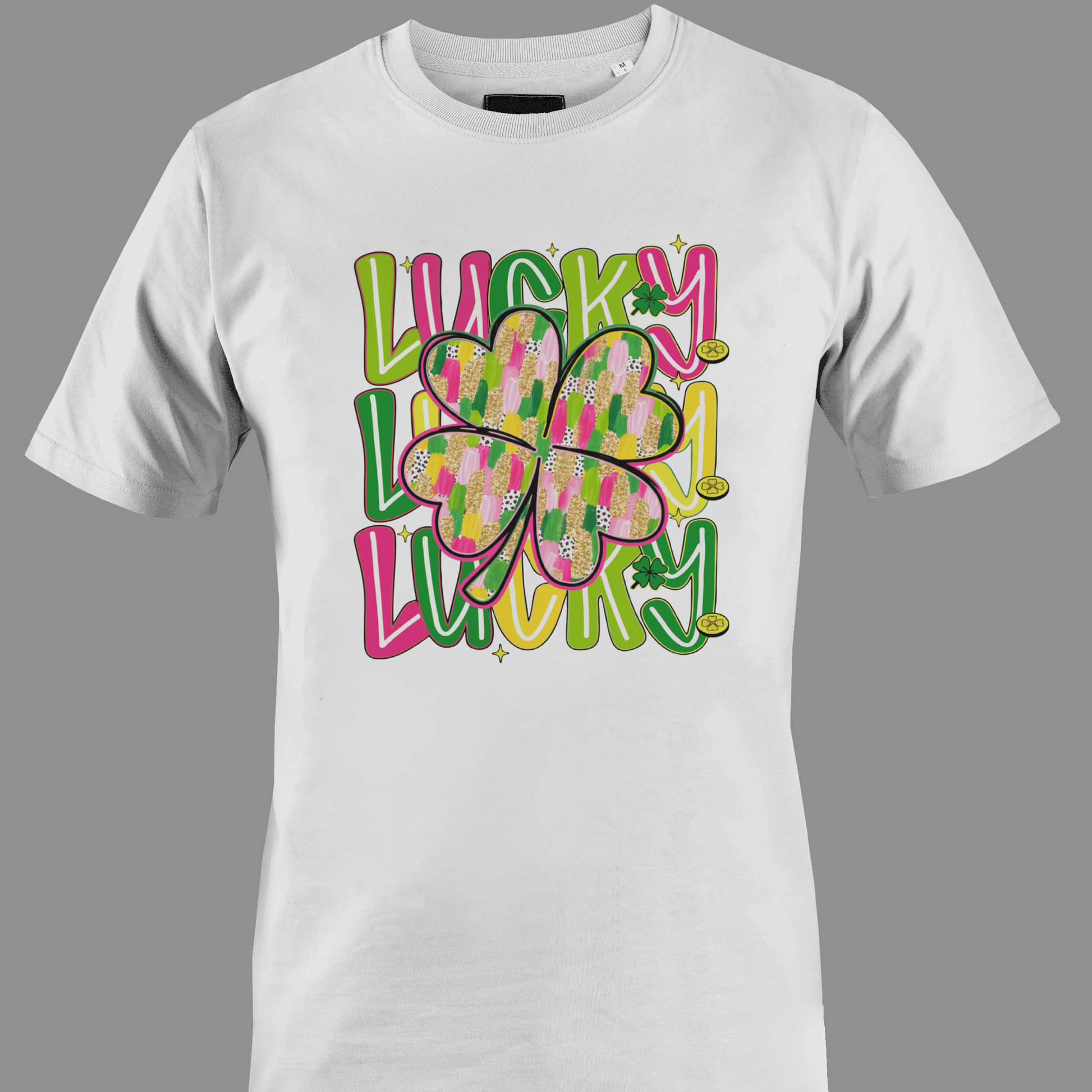 White t-shirt with colorful text 'Lucky' and a shamrocks