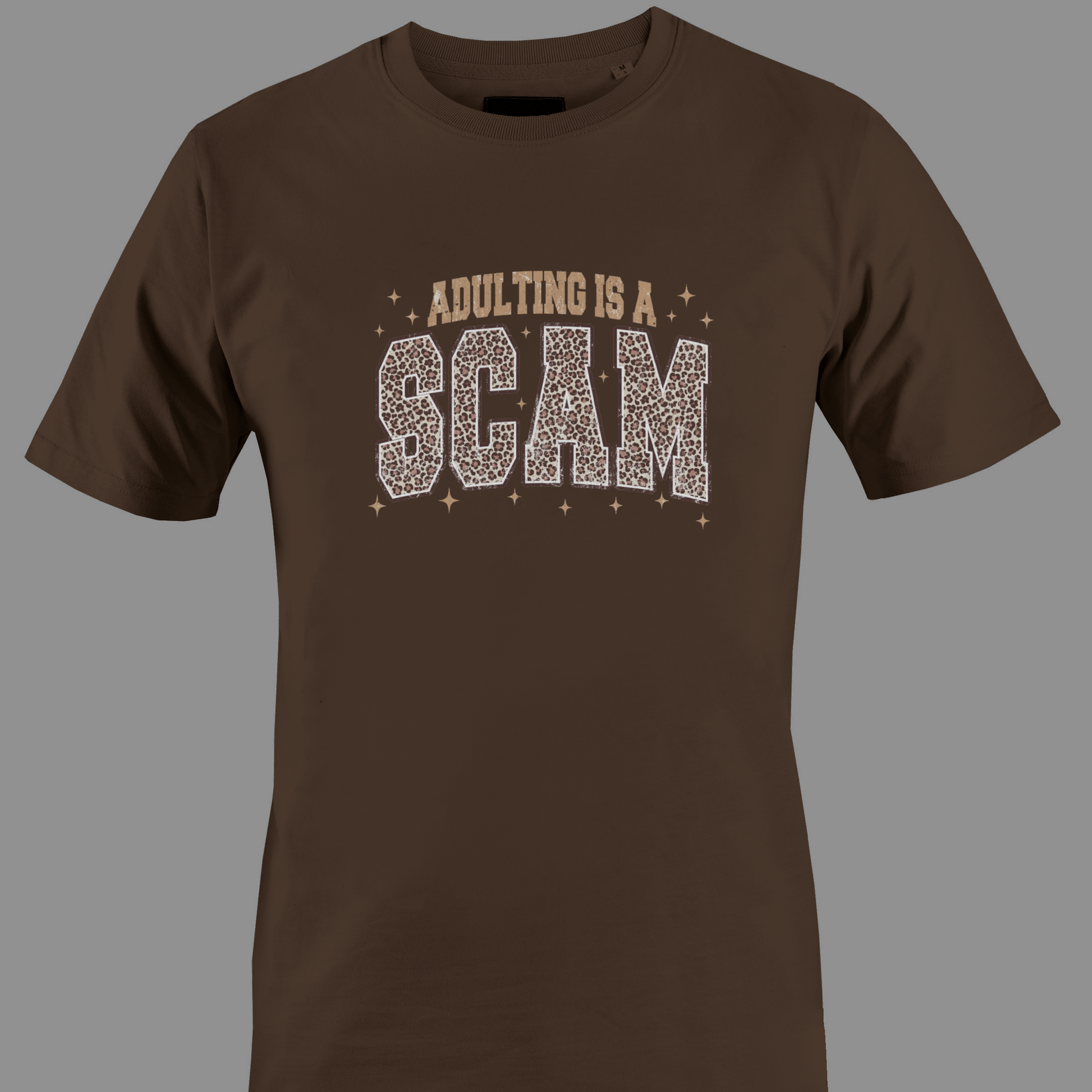 Brown t-shirt with 'Adulting is a Scam' text