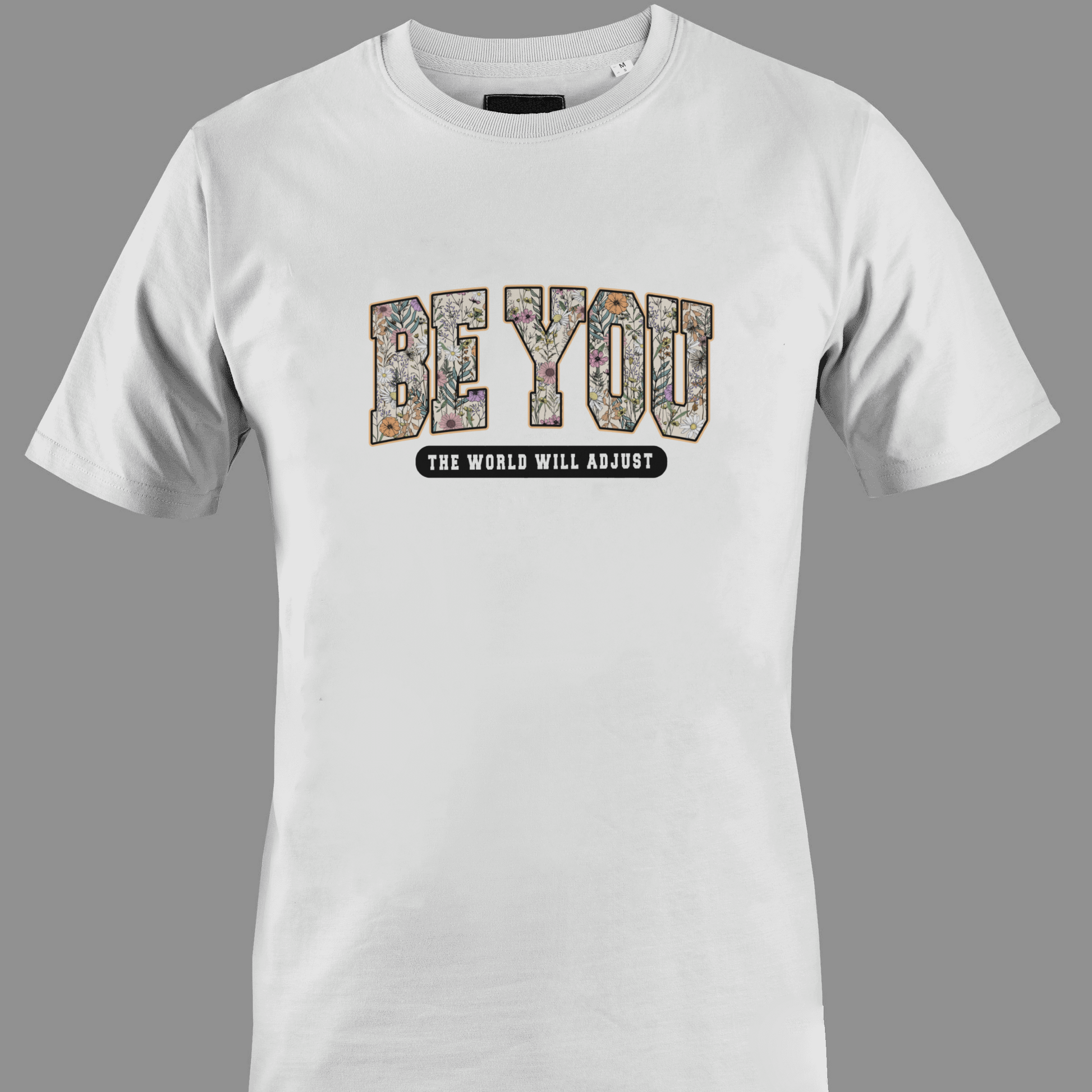 White t-shirt with 'BE YOU THE WORLD WILL ADJUST' text