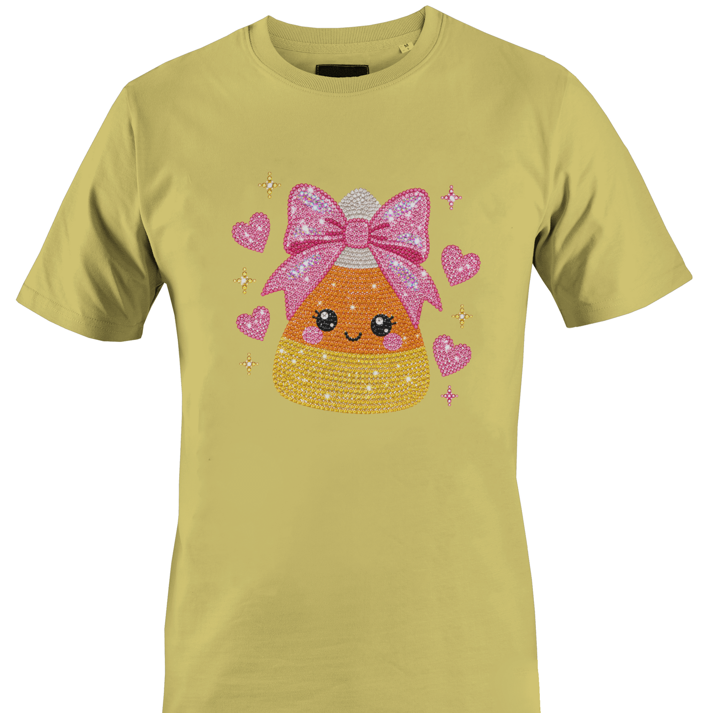 Yellow t-shirt featuring a sparkly bling candy corn wearing a pink bow surrounded by hearts for Halloween by Monkey's Creations. 