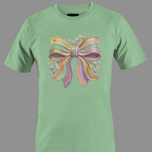 Green t-shirt with a colorful bow design and flowers