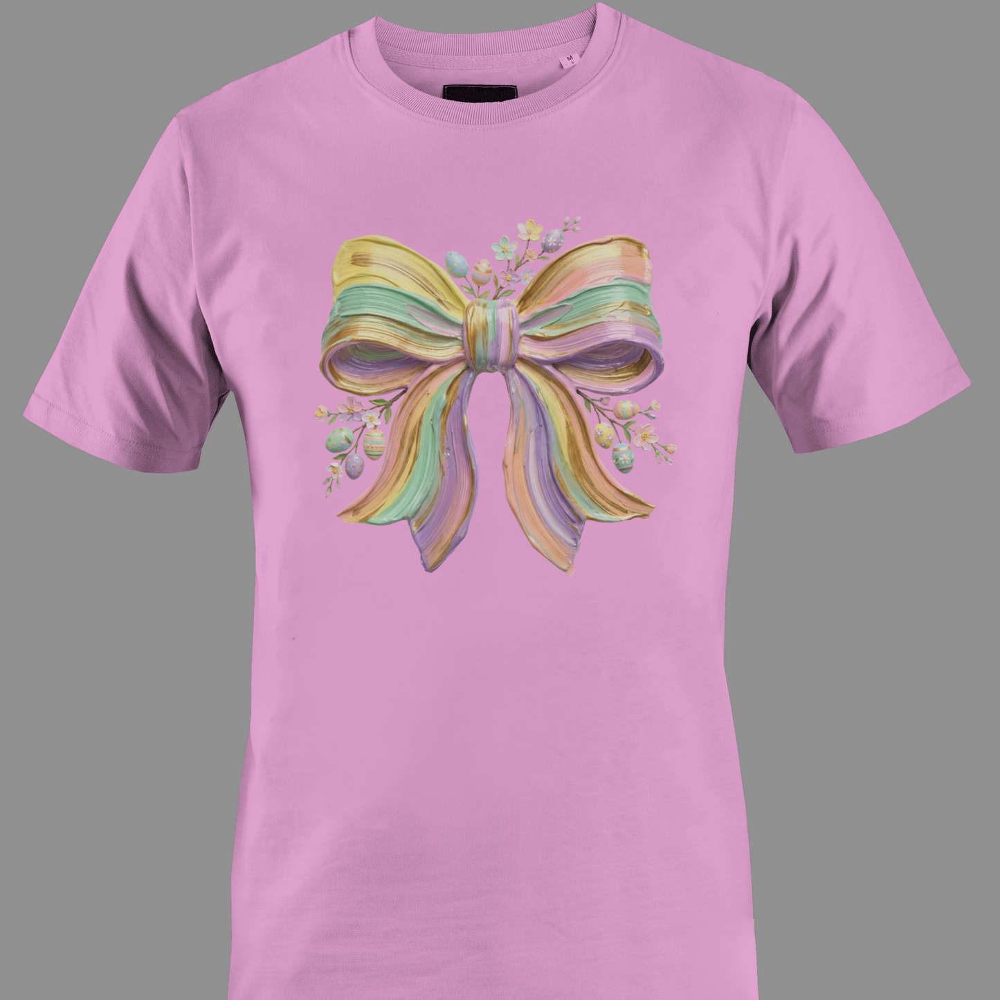Pink t-shirt with a colorful bow design and flowers