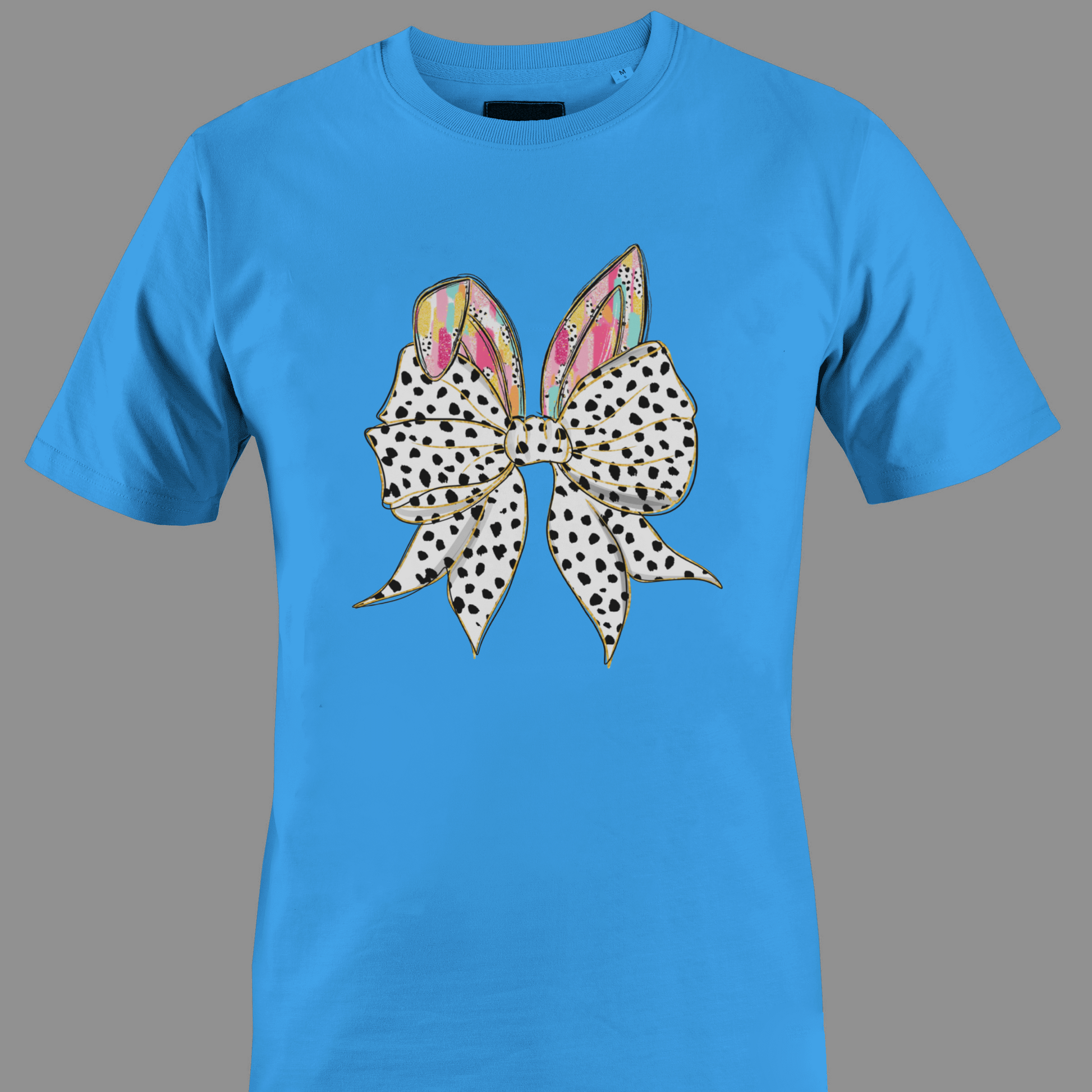 Blue t-shirt with a large polka dot bow and colorful rabbit ears