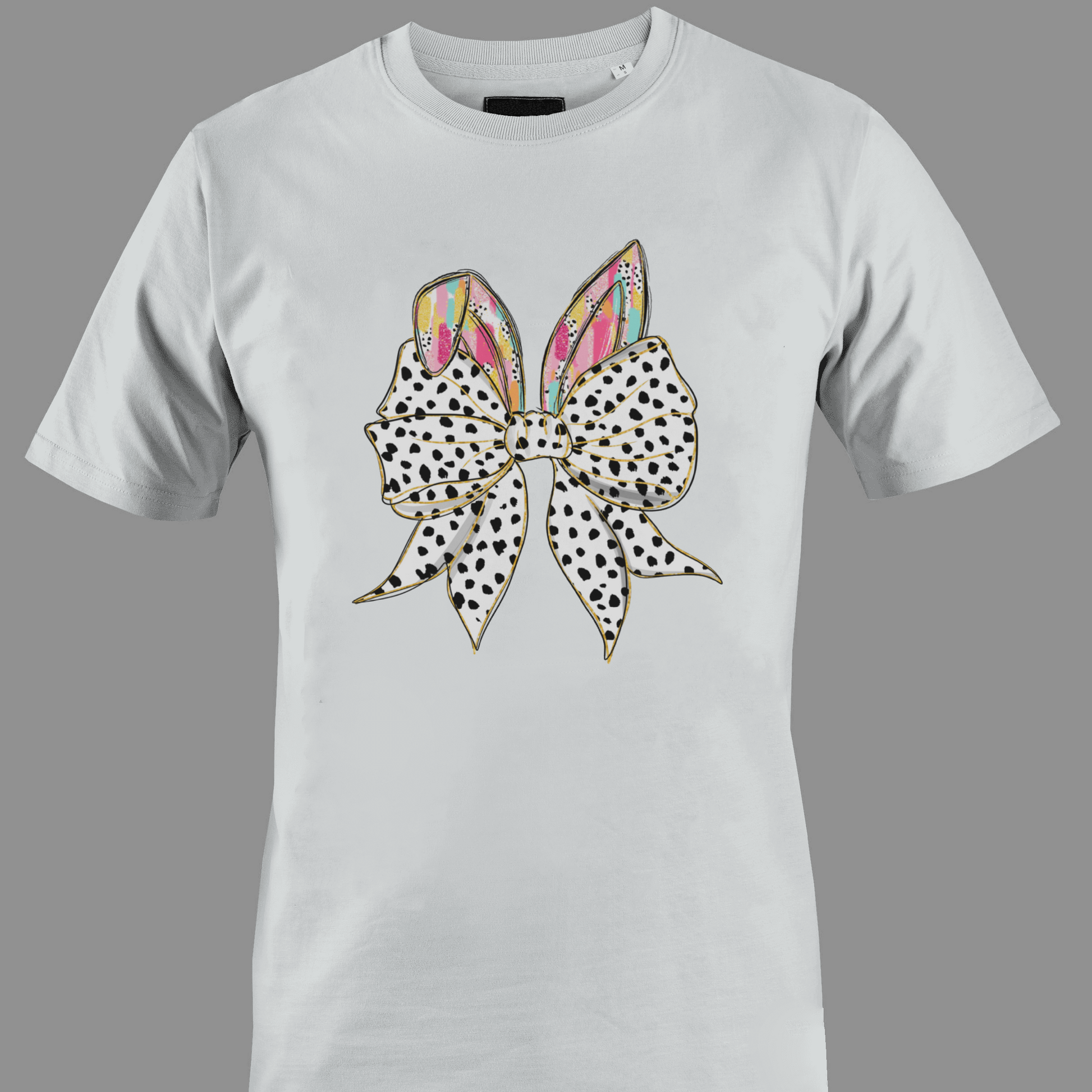 White t-shirt with a large polka dot bow and colorful rabbit ears