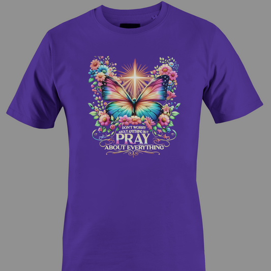 Dark purple  t-shirt with a colorful butterfly and florals with text Pray 