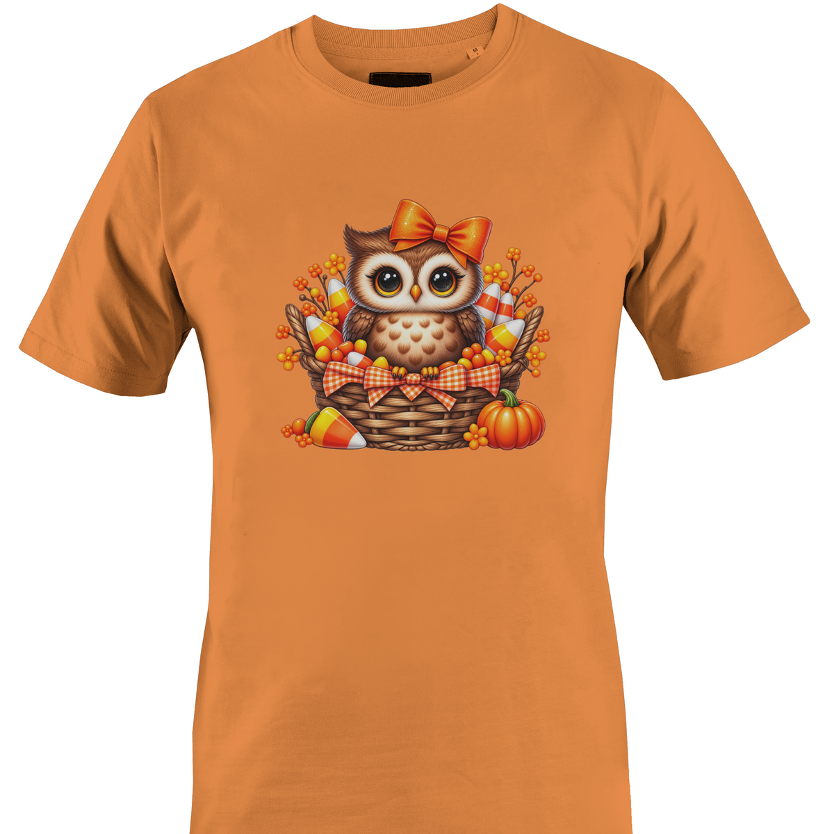 Orange t-shirt by Monkey's Creations featuring an owl in a basket with pumpkins and candy corn.