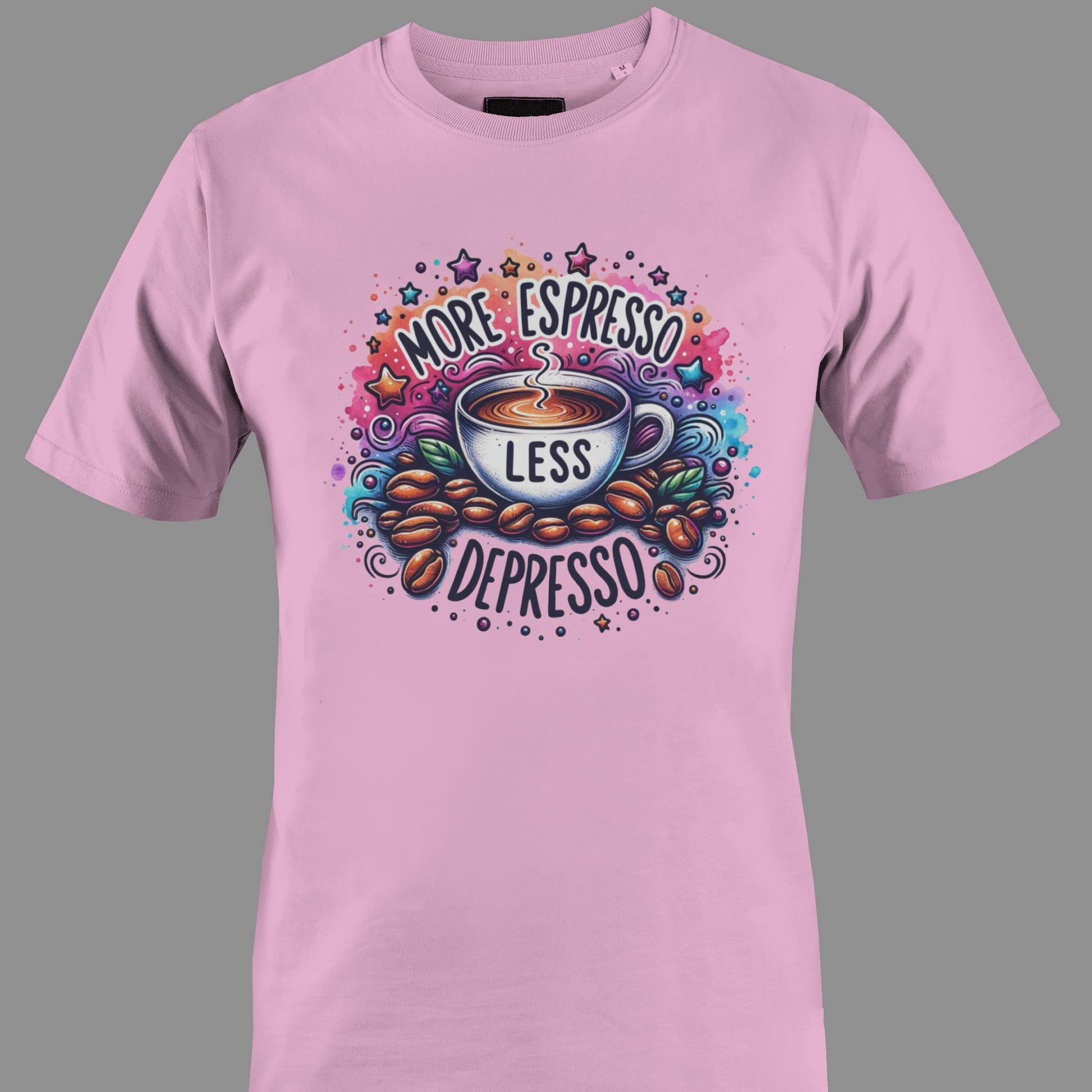 Light pink t-shirt with Iced coffee, flowers, and a hand holding a pen, with text 'Fueled by Coffee & Feminist Rage'.