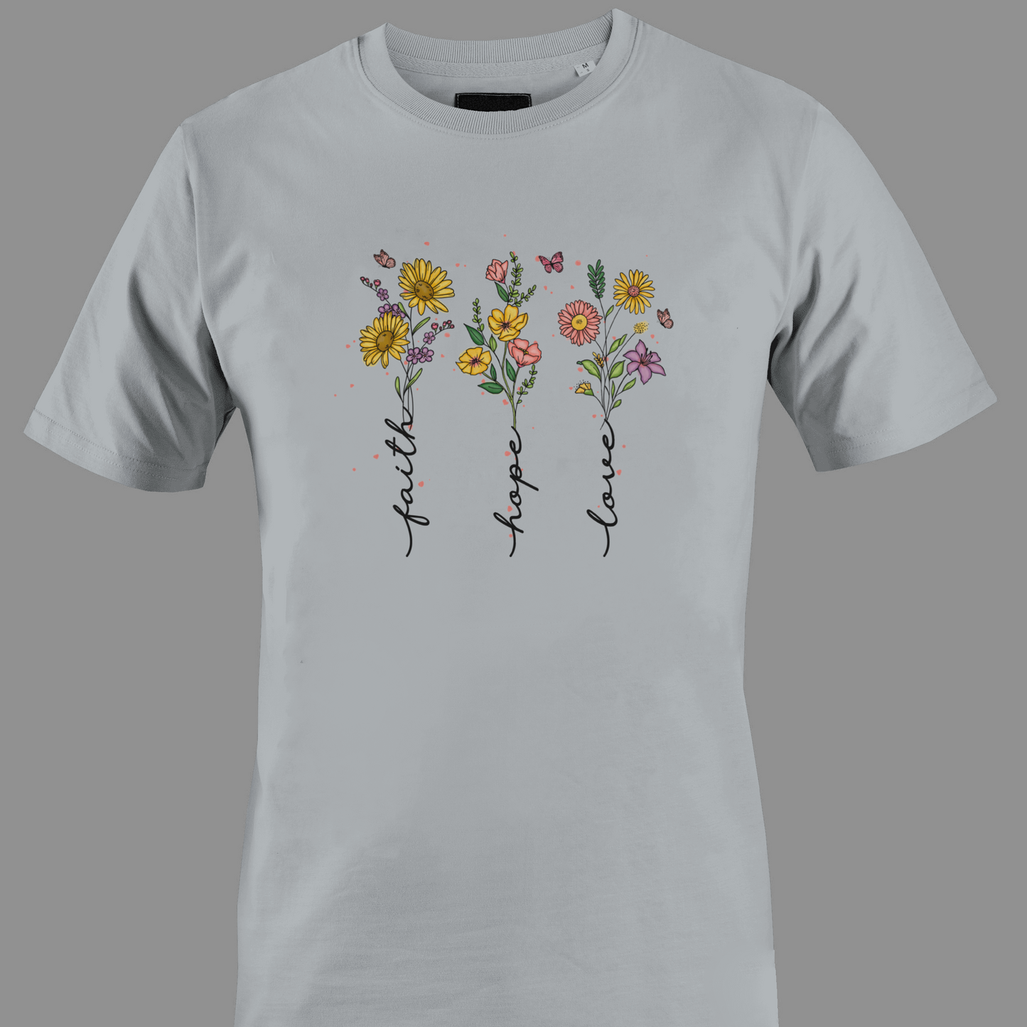 Light gray t-shirt with flowers with stem text 'faith', 'hope', and 'love' 