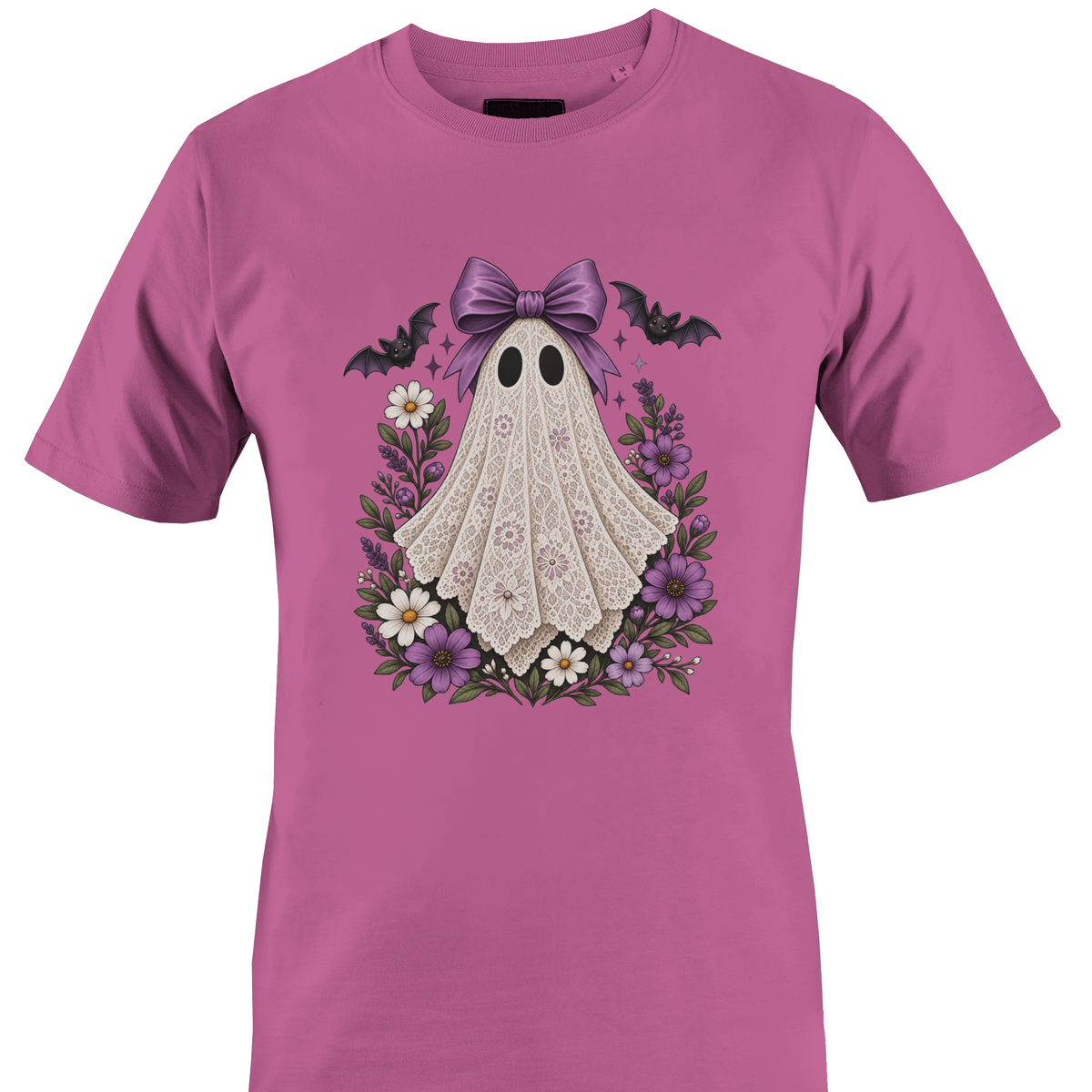 A pink short-sleeve crewneck t-shirt featuring a graphic of a cute ghost draped in white lace, wearing a purple bow, and surrounded by purple and white flowers by Monkey's Creations.