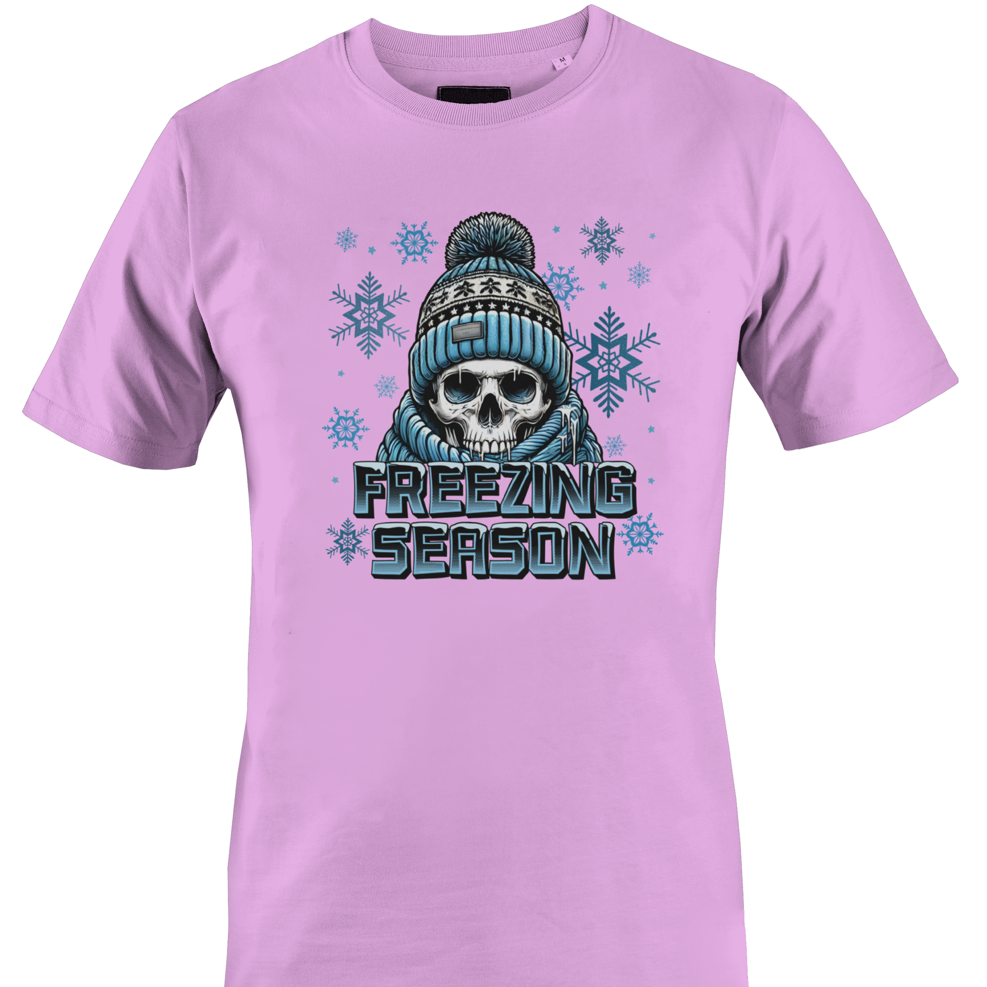 Pink t-shirt with a skull wearing a hat and scarf and the text "freezing season" by Monkey's Creations.