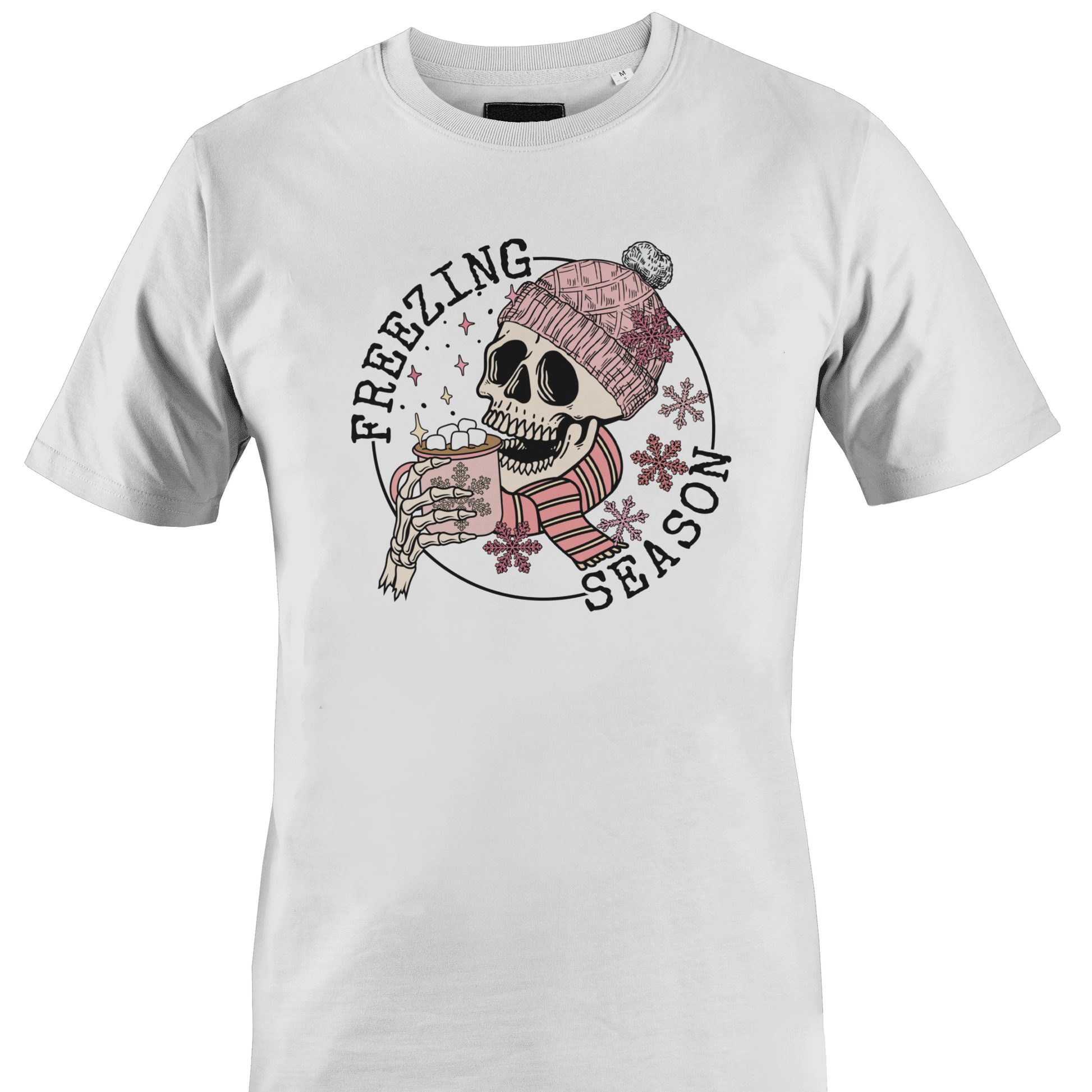 White t-shirt with a skull wearing a hat and scarf with a hot chocolate and the text "freezing season" by Monkey's Creations.