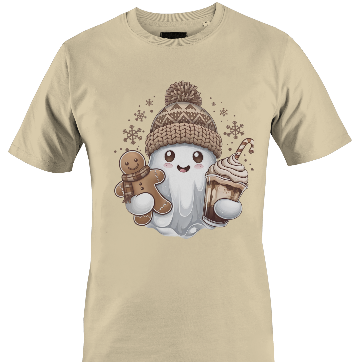 Tan t-shirt with a ghost wearing a hat, snowflakes, a gingerbread cookie and a sweet treat by Monkey's Creations. 
