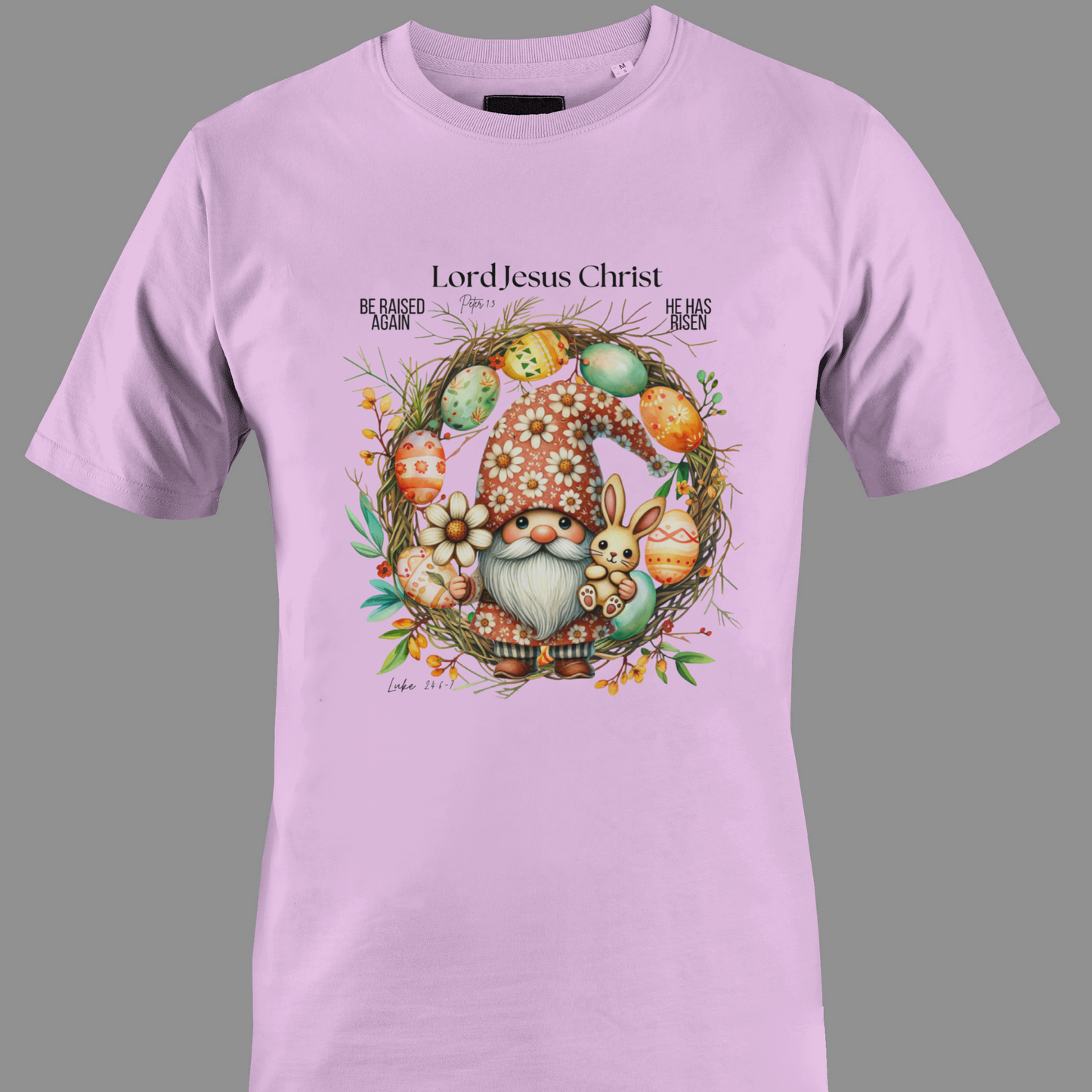 Light purple t-shirt with an Easter gnome with a bunny, and Easter eggs surrounded by a wreath.