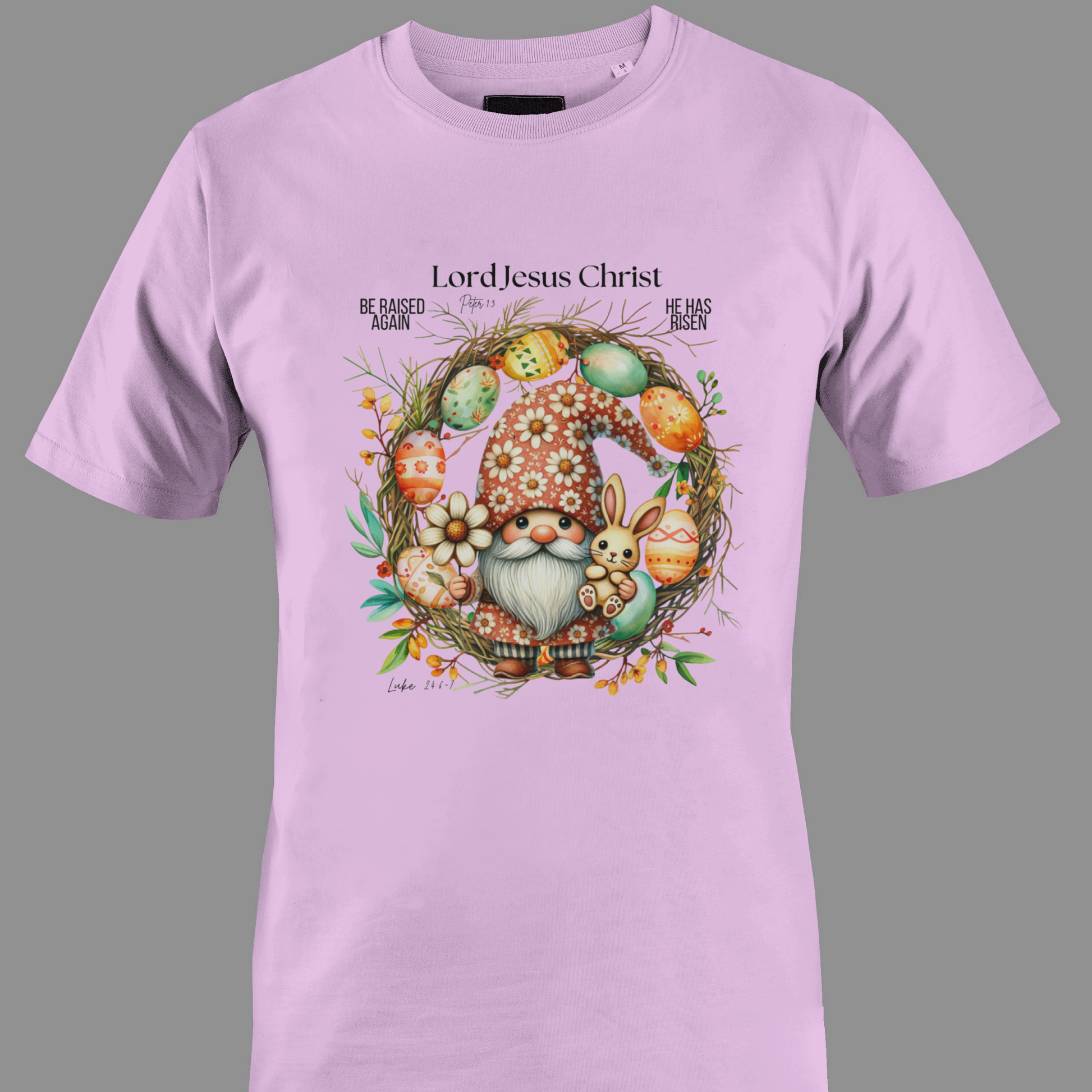 Light purple t-shirt with an Easter gnome with a bunny, and Easter eggs surrounded by a wreath.