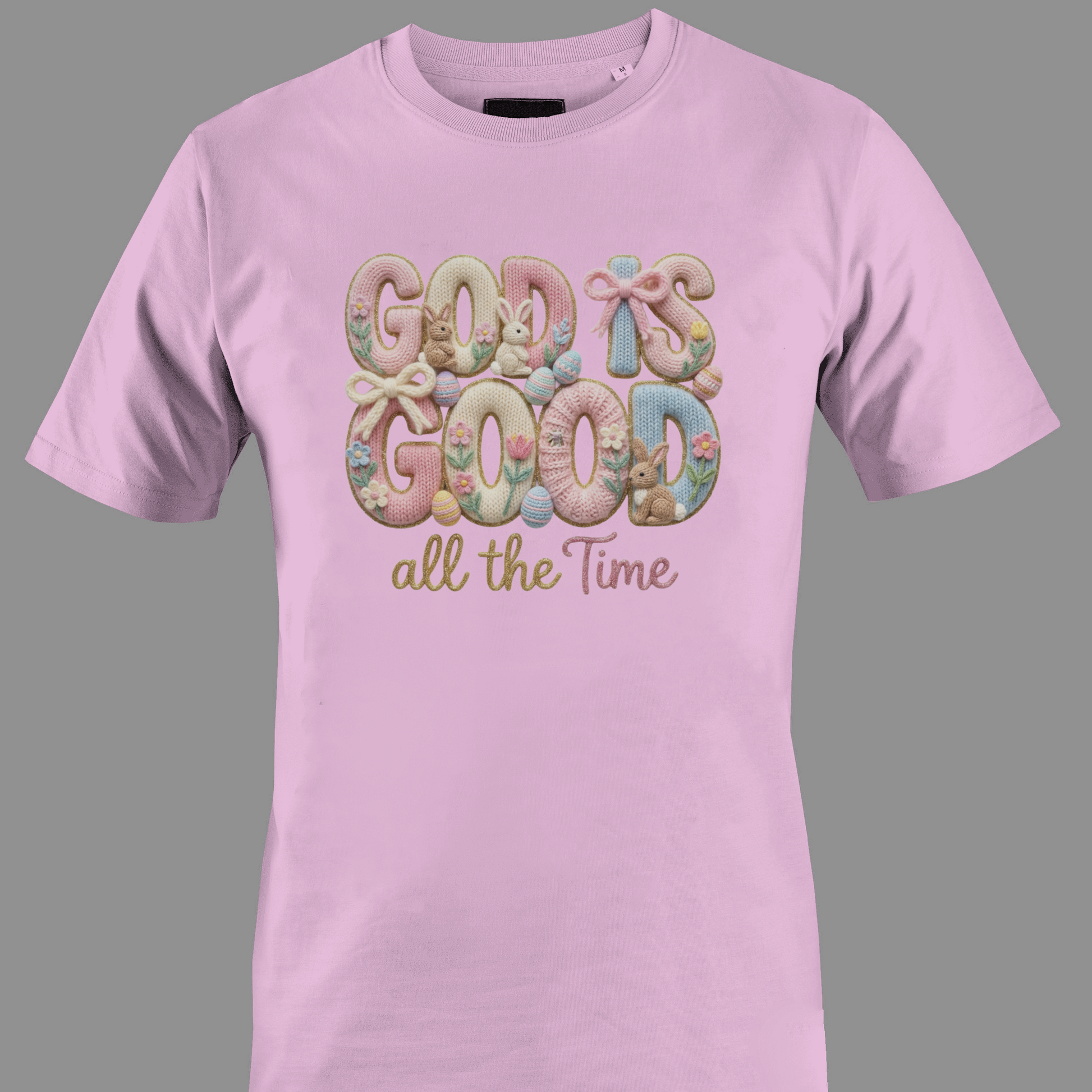 Light pink t-shirt with 'God is Good all the Time' text 