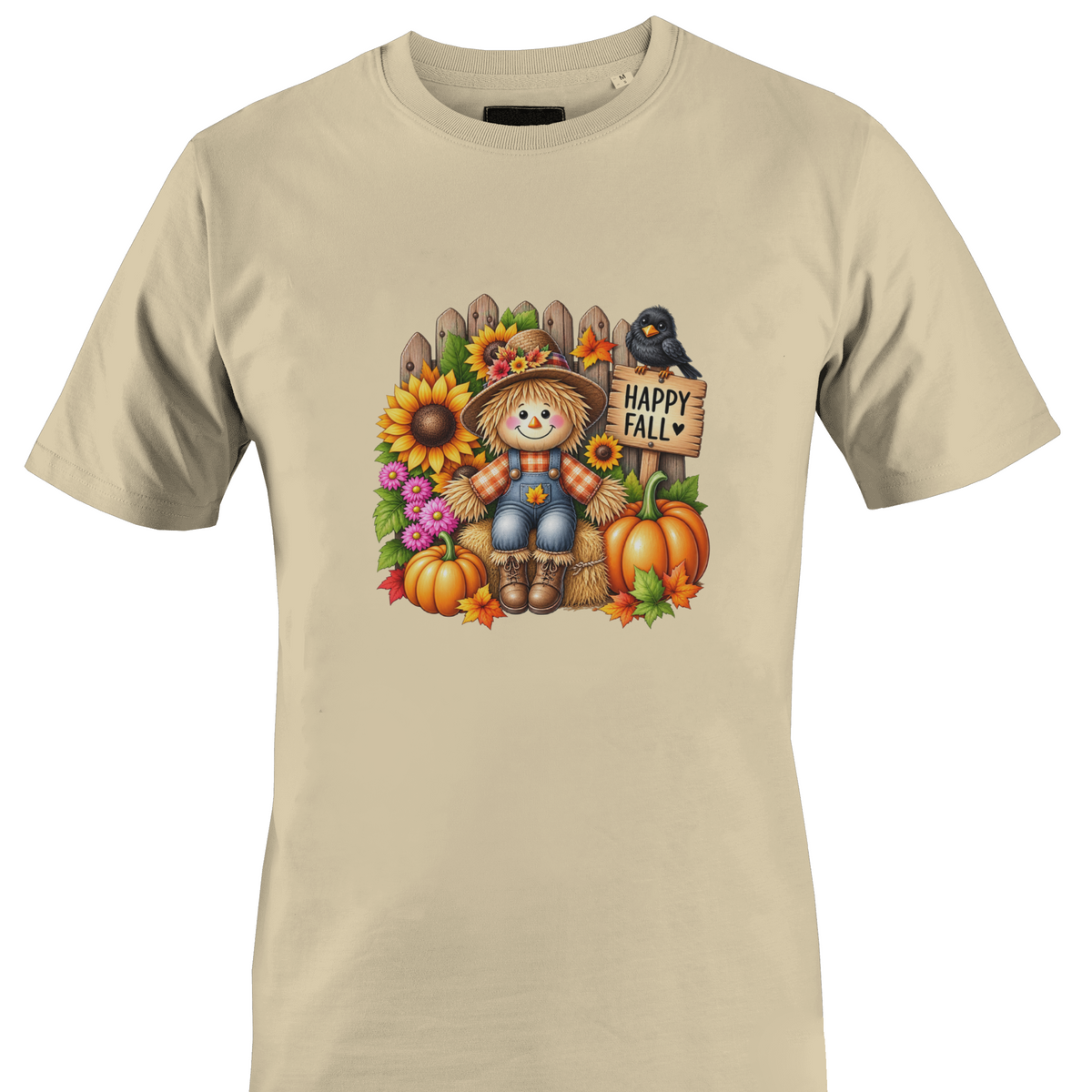 Tan t-shirt by Monkey's Creations featuring a scarecrow with sunflowers and pumpkins with "happy fall" sign.