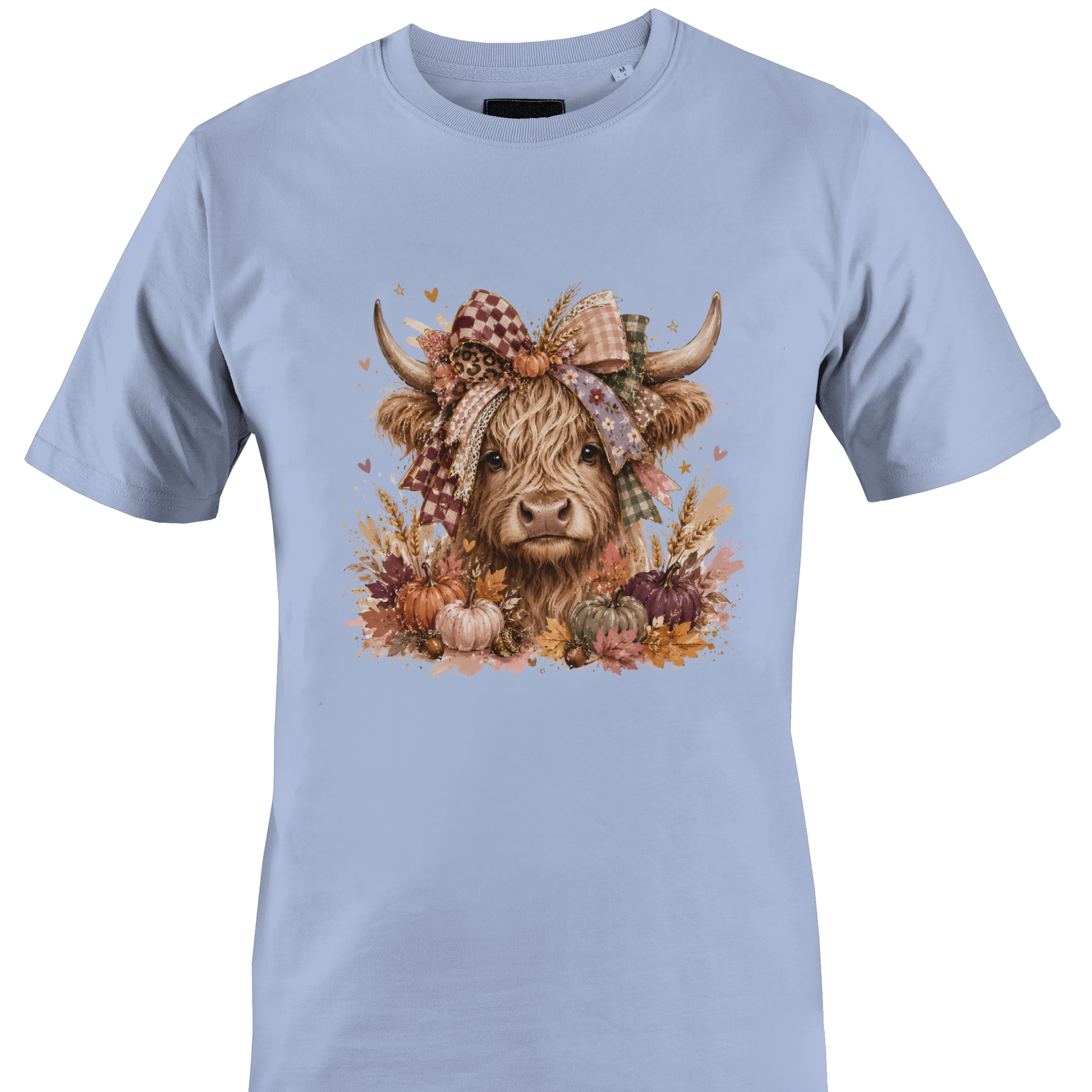Light blue t-shirt with a highland cow wearing a farmhouse style bow with pumpkins and fall foliage by Monkey's Creations. 