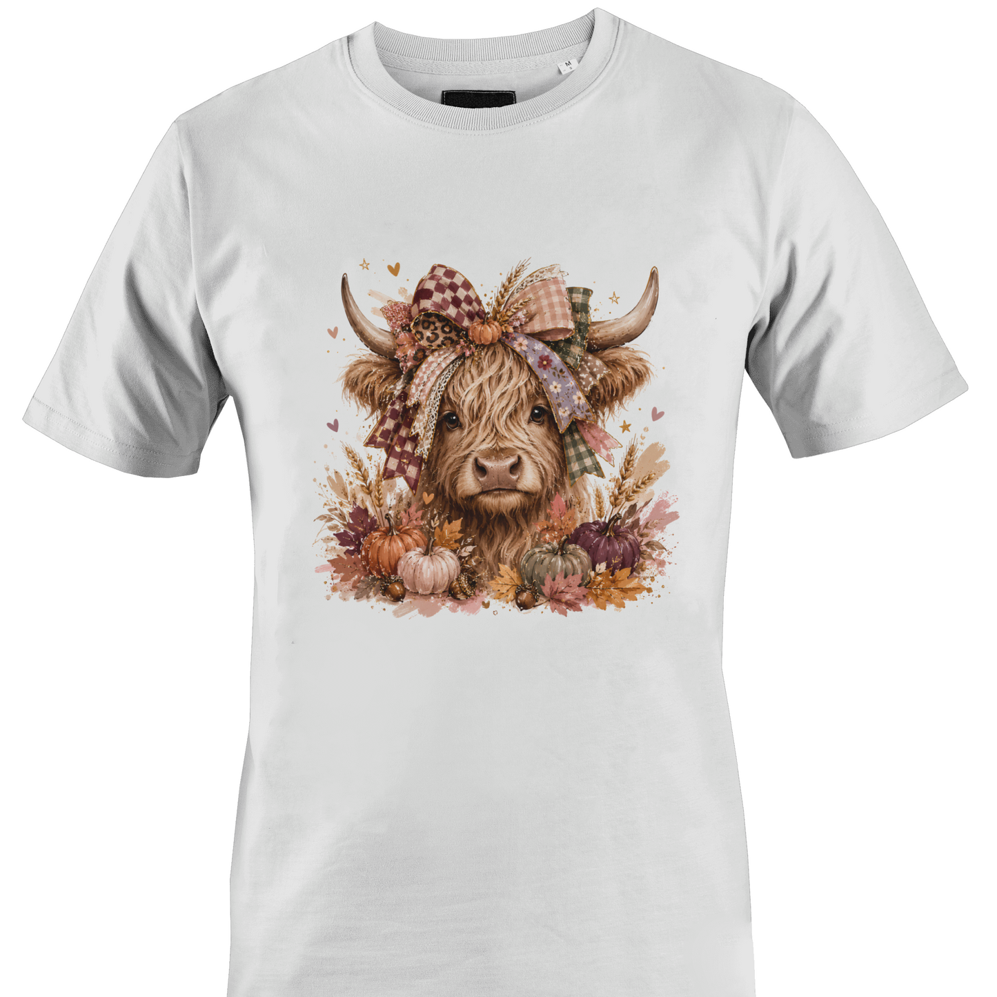 White t-shirt with a highland cow wearing a farmhouse style bow with pumpkins and fall foliage by Monkey's Creations. 