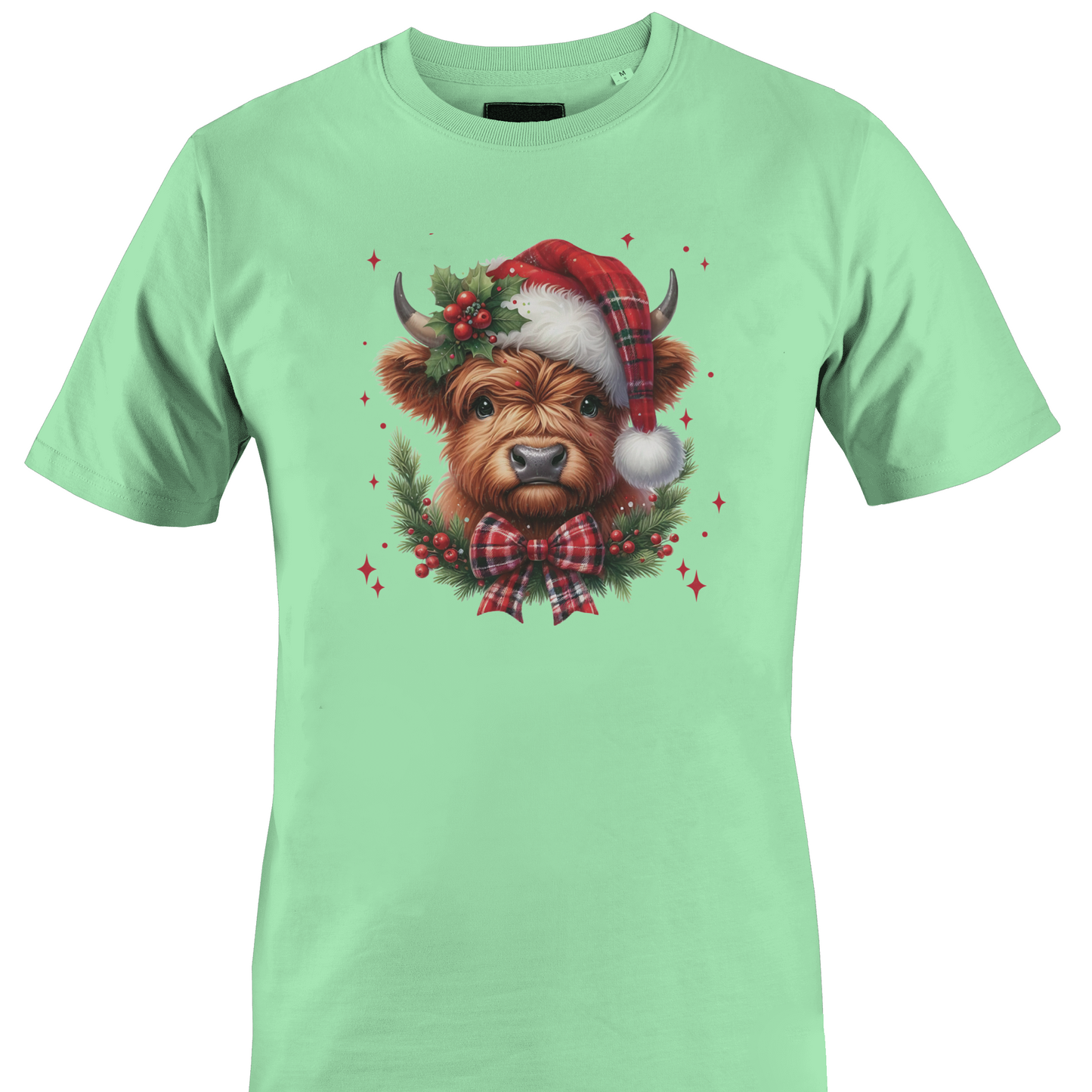 mint green t-shirt with a highland cow wearing a plaid santa hat with holly berries and a plaid bow by Monkey's Creations. 