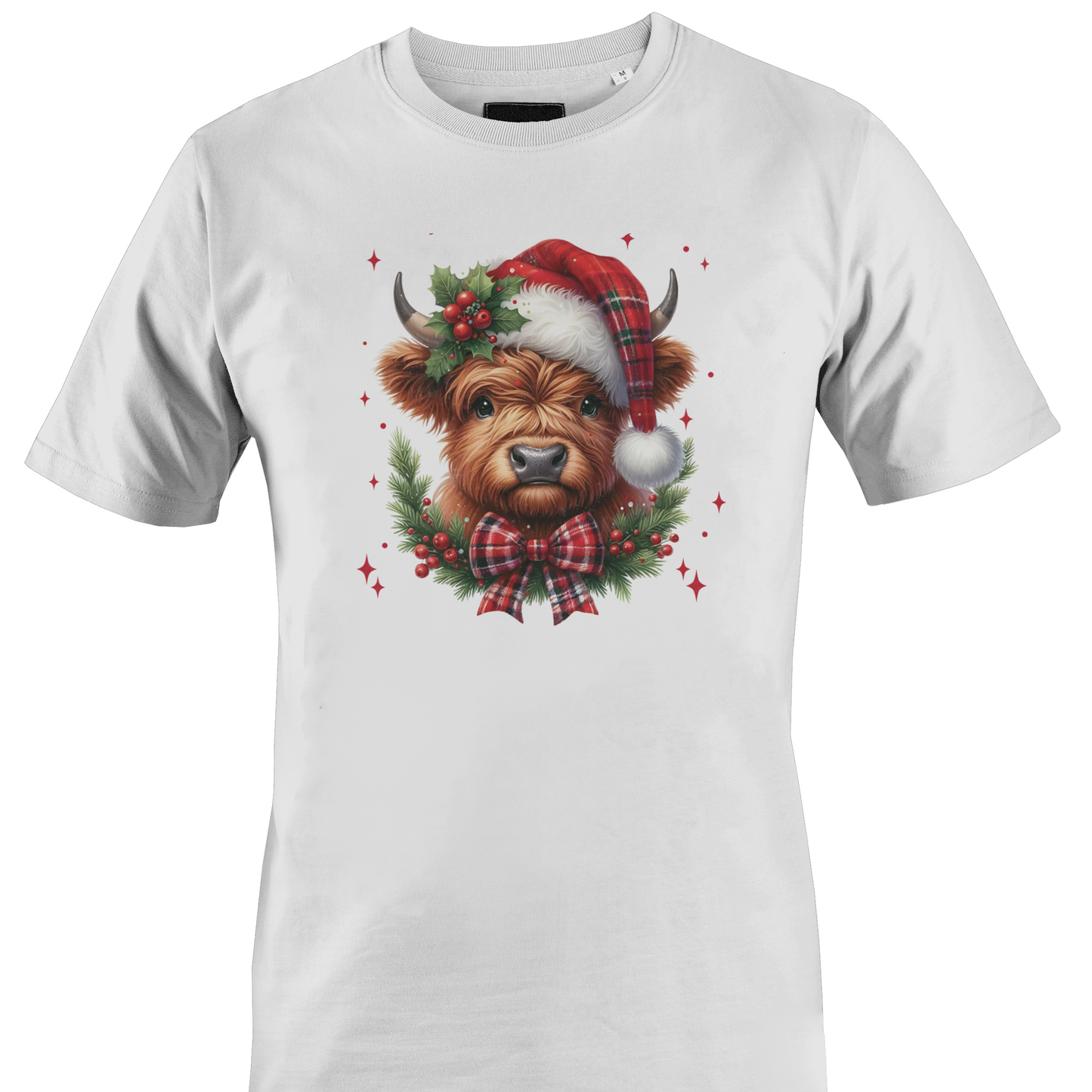 White t-shirt with a highland cow wearing a plaid santa hat with holly berries and a plaid bow by Monkey's Creations. 