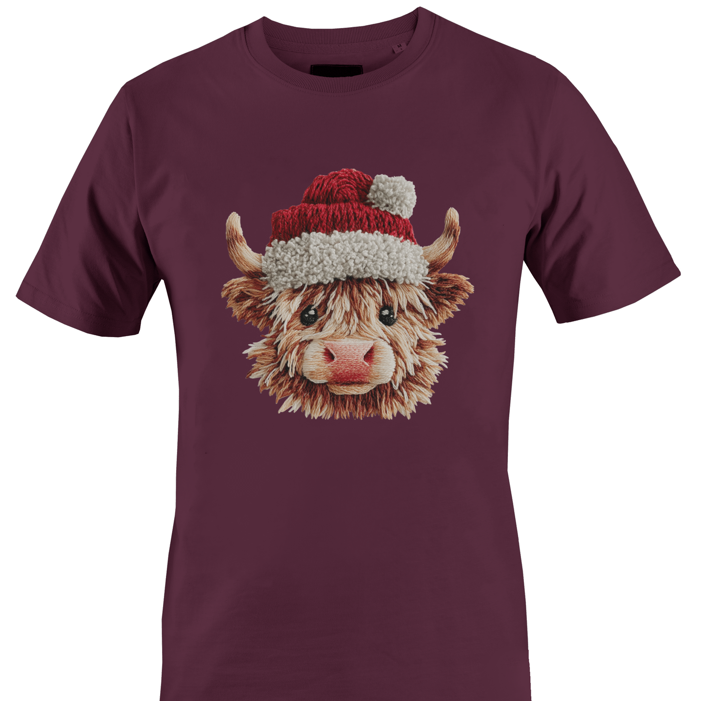 Brown t-shirt with a highland cow wearing a yarn Santa hat by Monkey's Creations. 