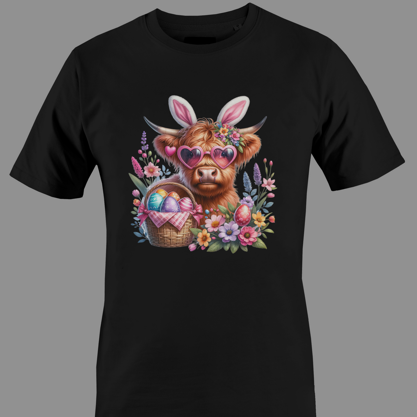 Black t-shirt with a highland cow wearing heart glasses with an easter egg basket and flowers