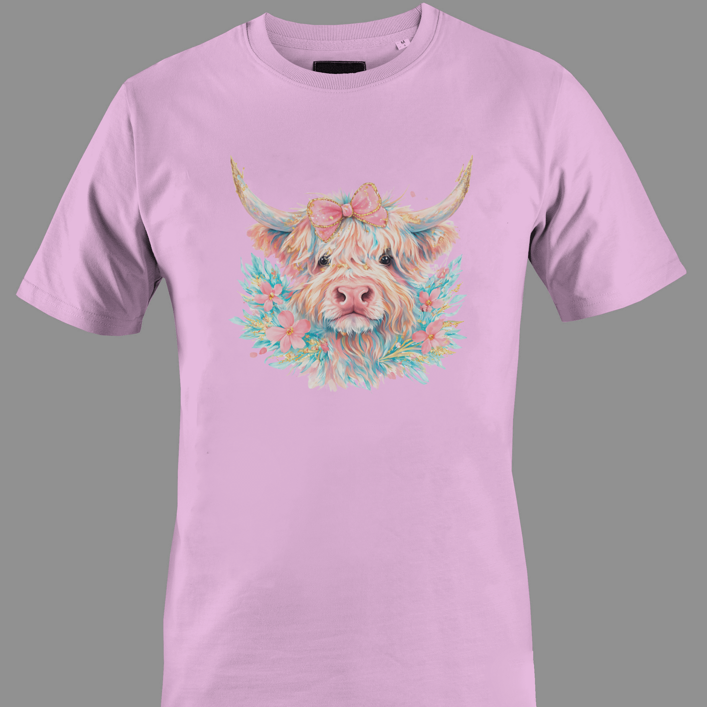 Light pink t-shirt with a multi-color highland cow 
